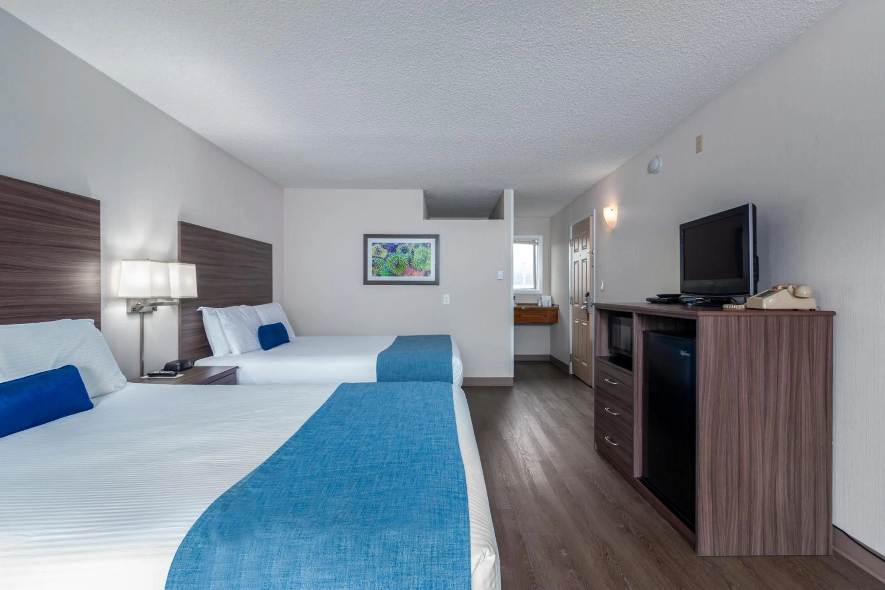 Bed in Seashore Inn on the Beach Seaside