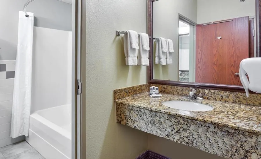 Bathroom in AmericInn by Wyndham Vidalia