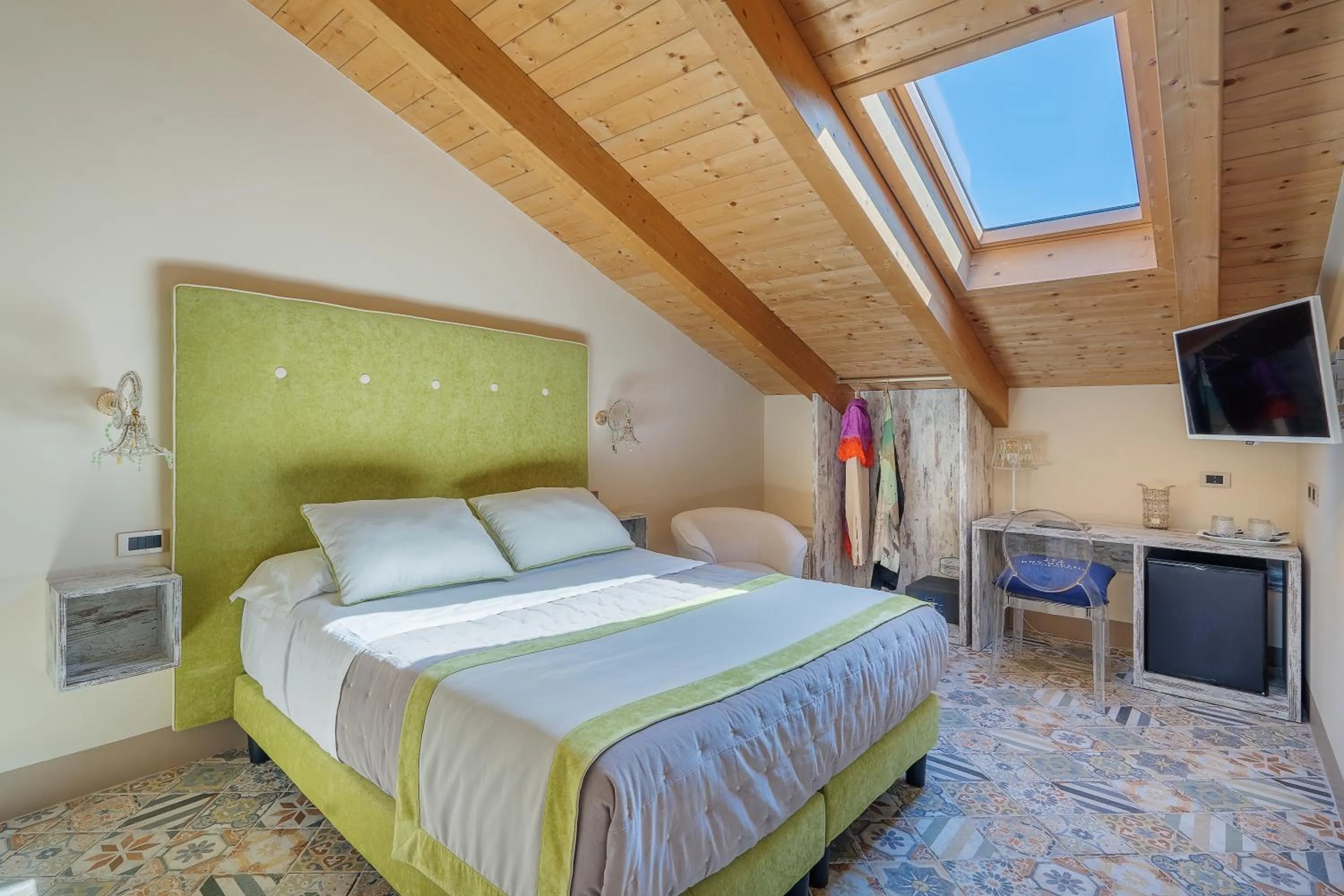 Bed in DON GIULIO LUXURY ROOMS jacuzzi