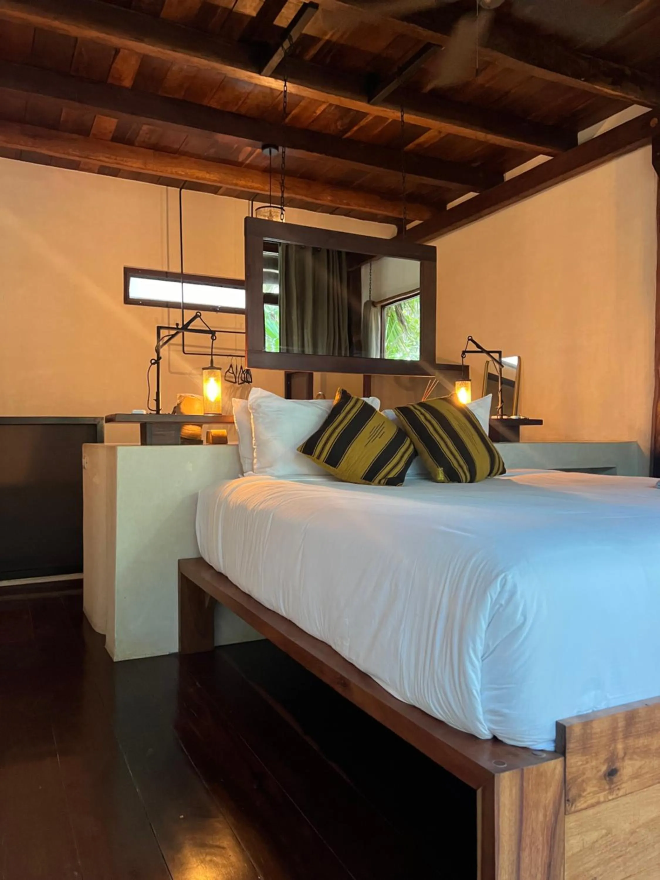 Bed in Libelula Tulum Beachfront Hotel