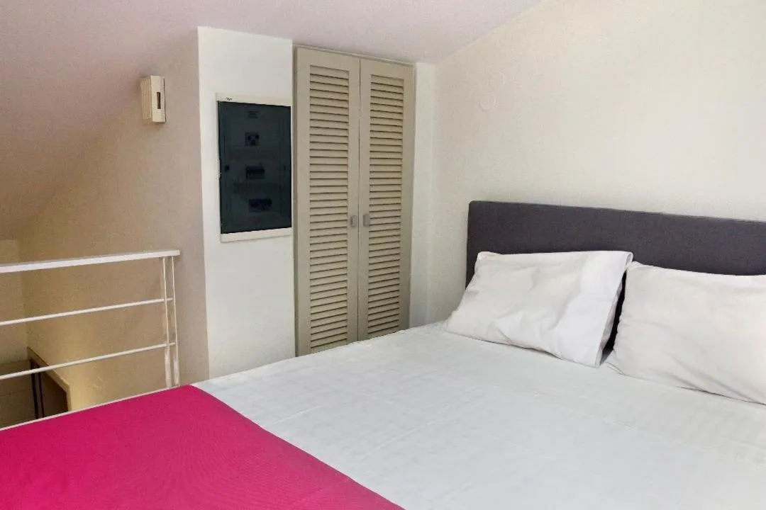 Bed in VIVIAN Art Apartments