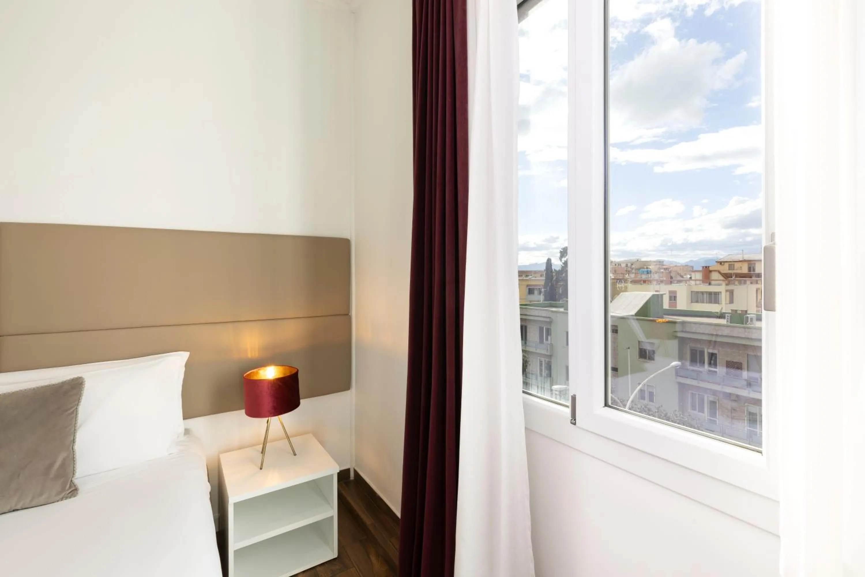 Bed in Mapi’s Rooms