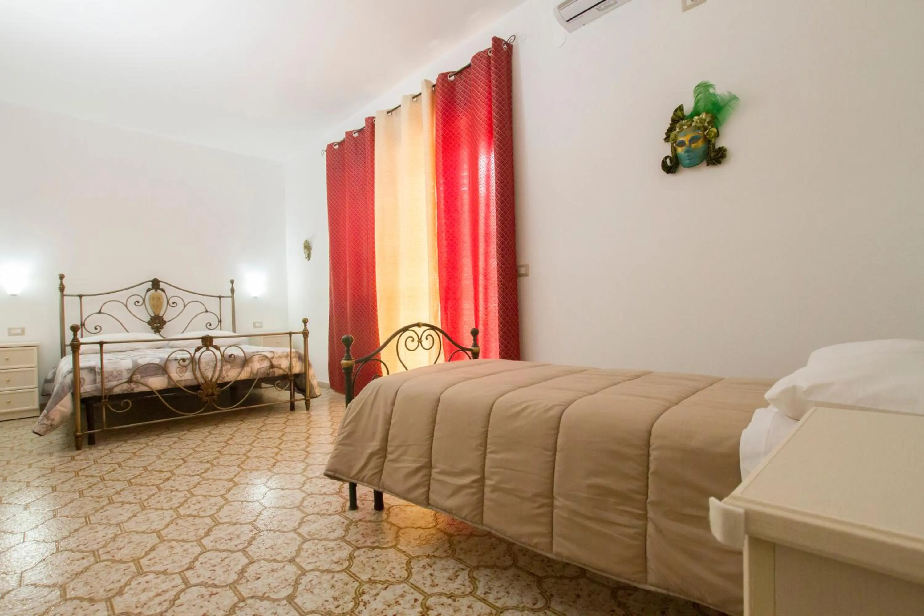 Photo of the whole room in Le Maschere B&B