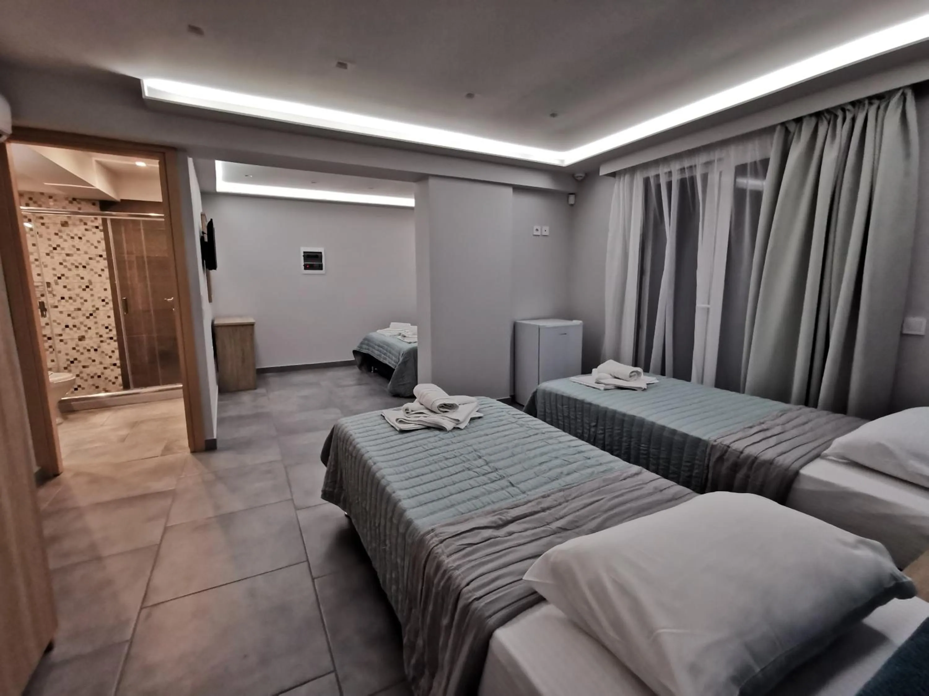 Bed in 3 Island View Hotel