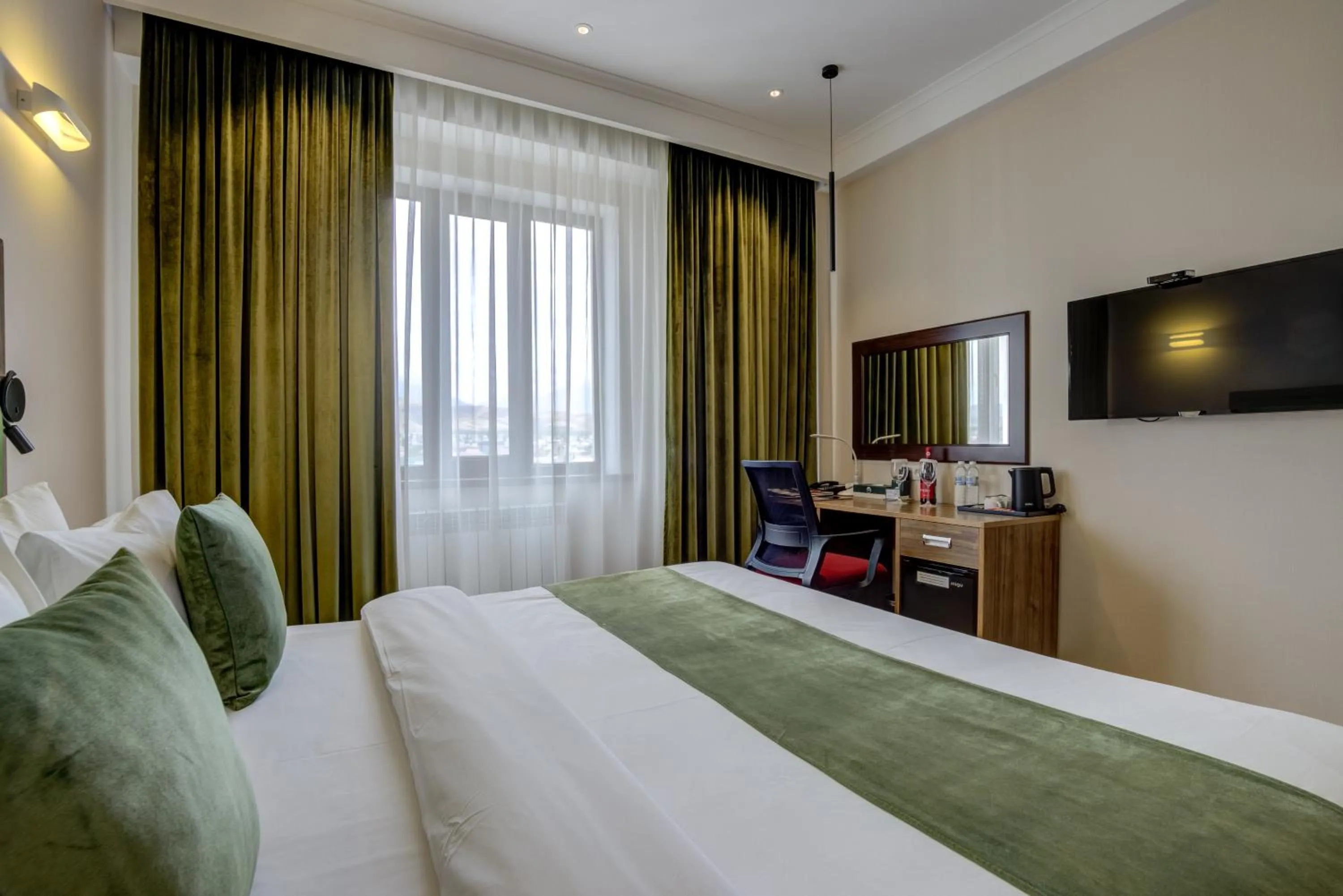 Bed in Garden Hotel & SPA