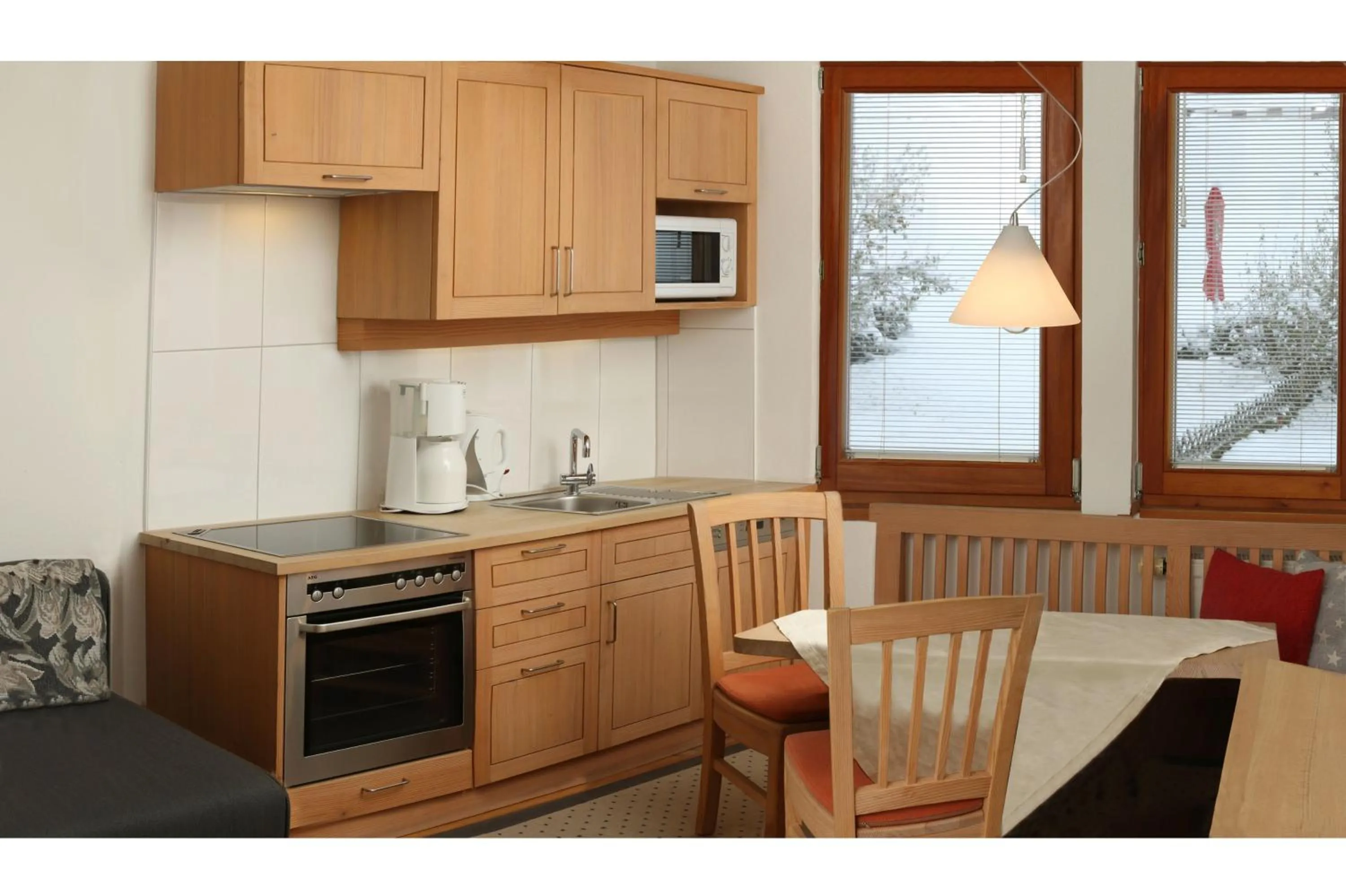 Kitchen or kitchenette in Biotel Bertel Naturappartements