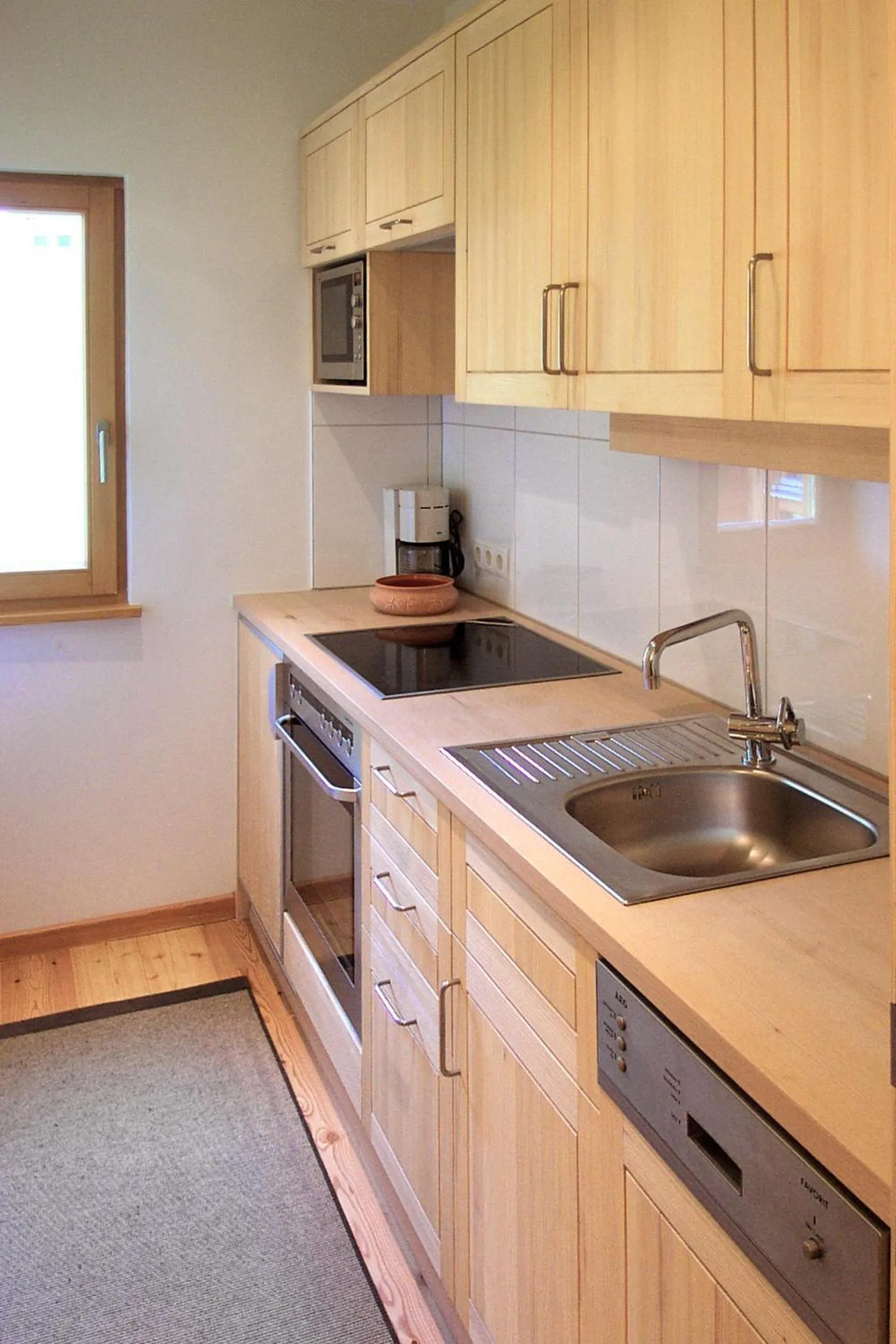 Kitchen or kitchenette in Biotel Bertel Naturappartements