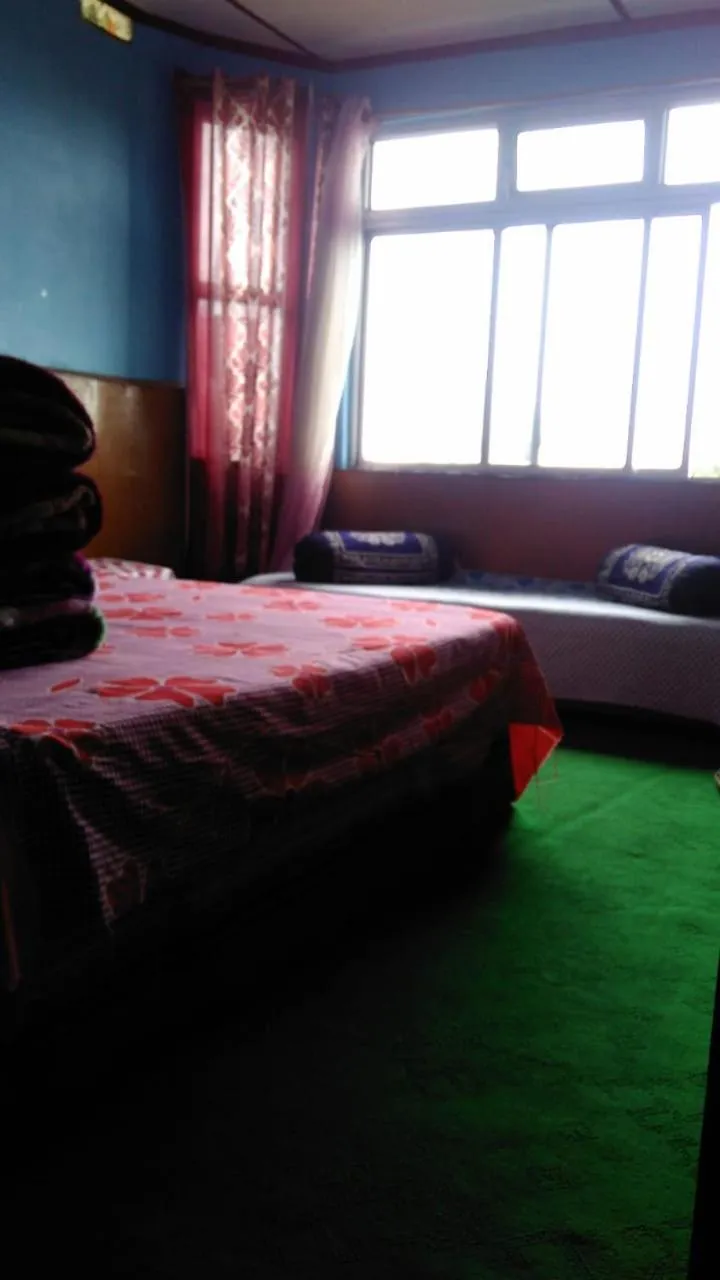 Bed in Kanchan Kanya Homestay