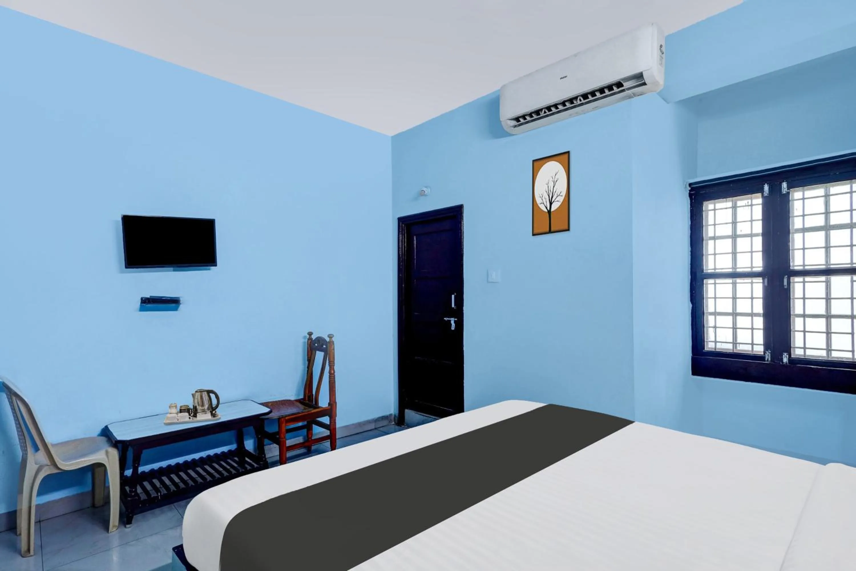 Bedroom, Bed in Super Hotel O Kennedy Nagar Near Railway Station formerly Jayalakshmi Residency