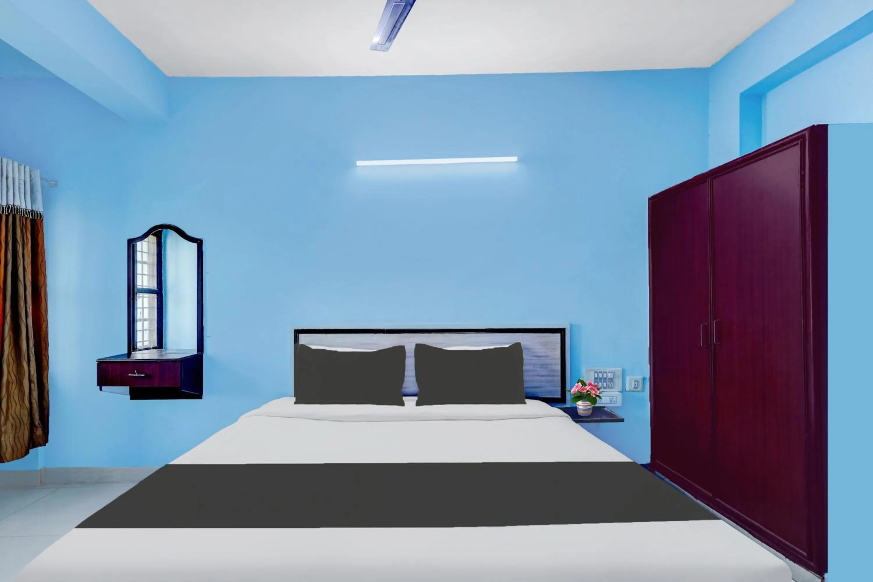 Bedroom, Bed in Super Hotel O Kennedy Nagar Near Railway Station formerly Jayalakshmi Residency