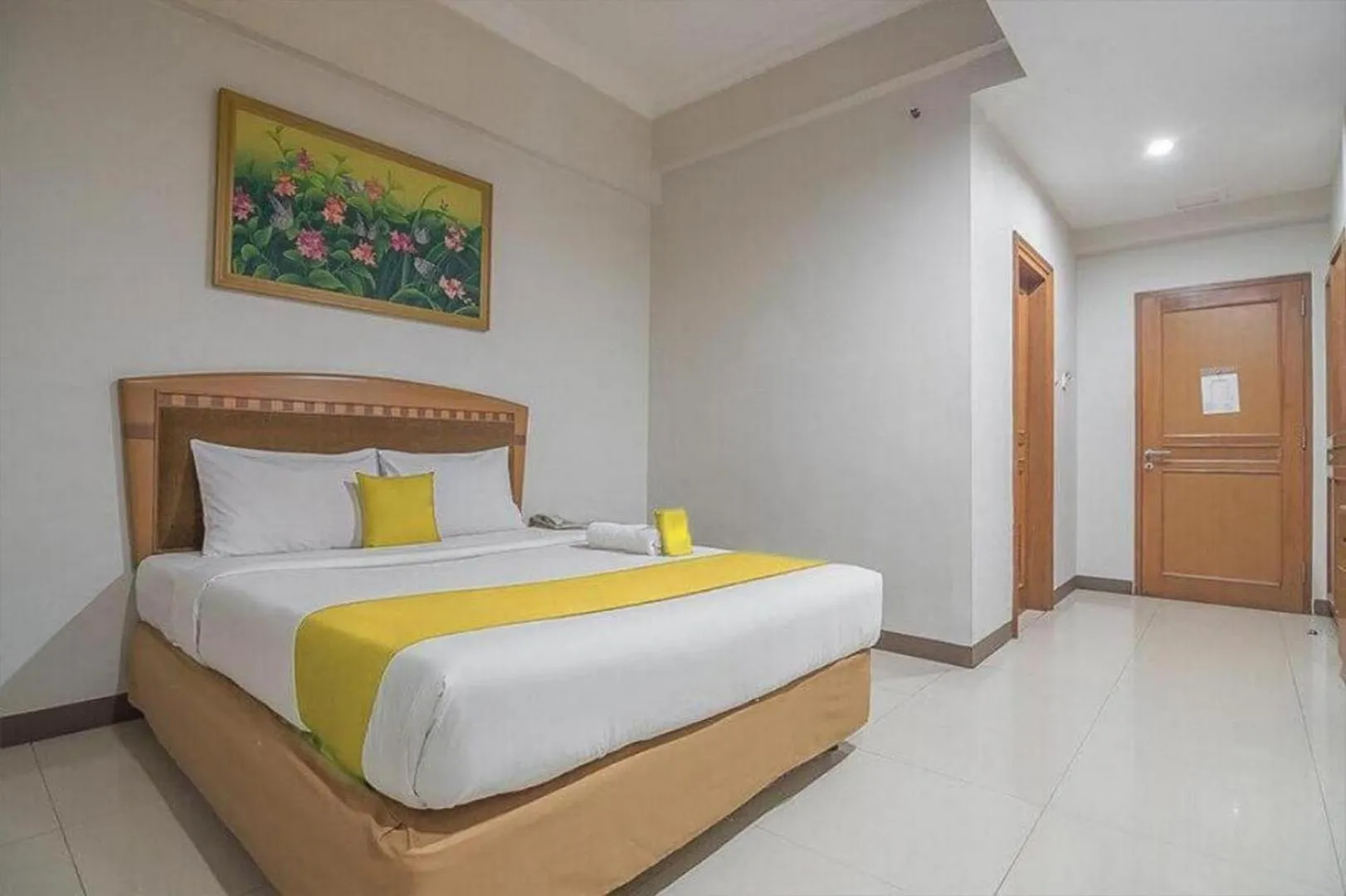Bed in Hotel Yehezkiel Surapati Mitra RedDoorz