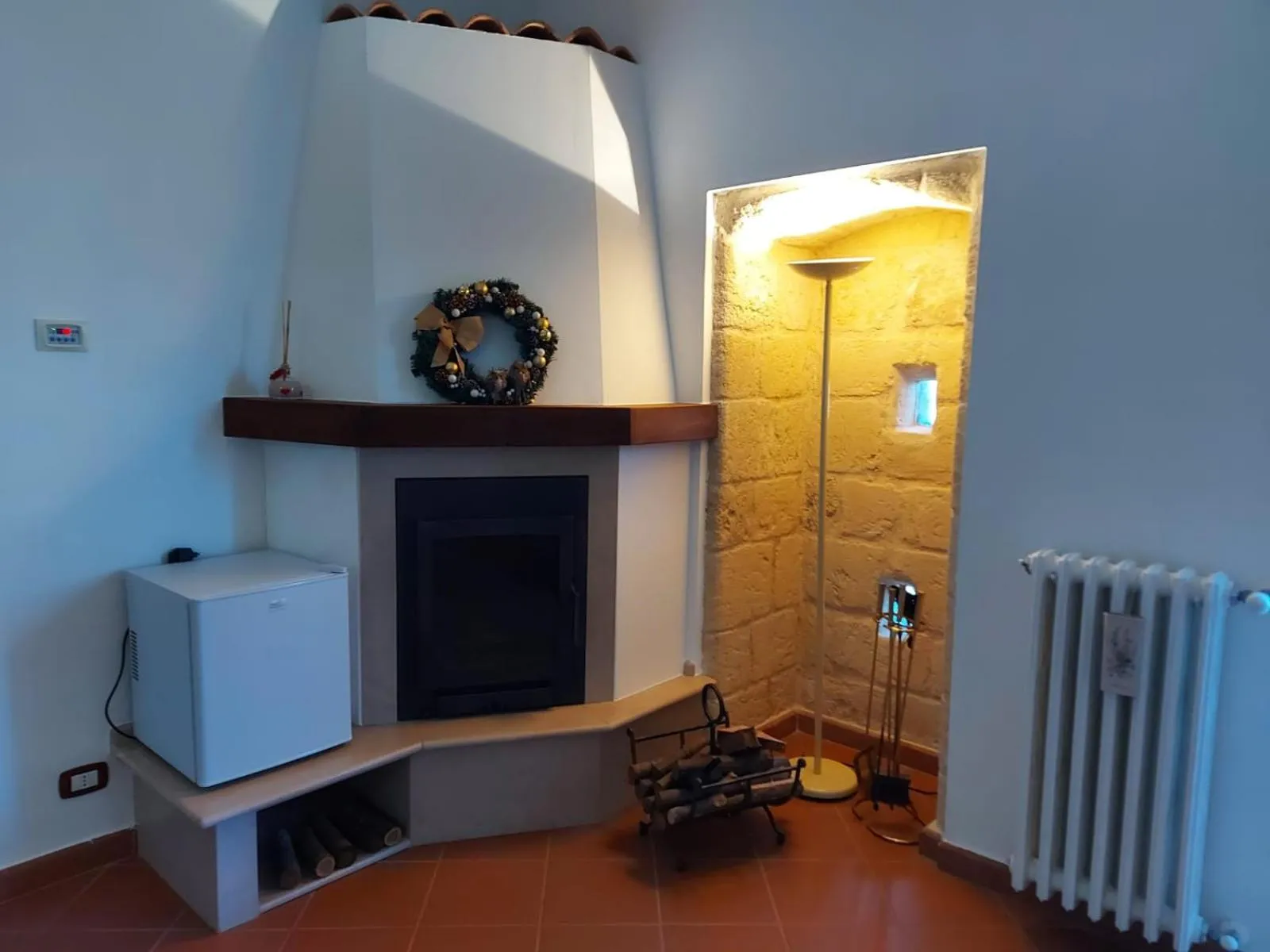 Communal lounge/ TV room in LA VILLA DEL CONTE