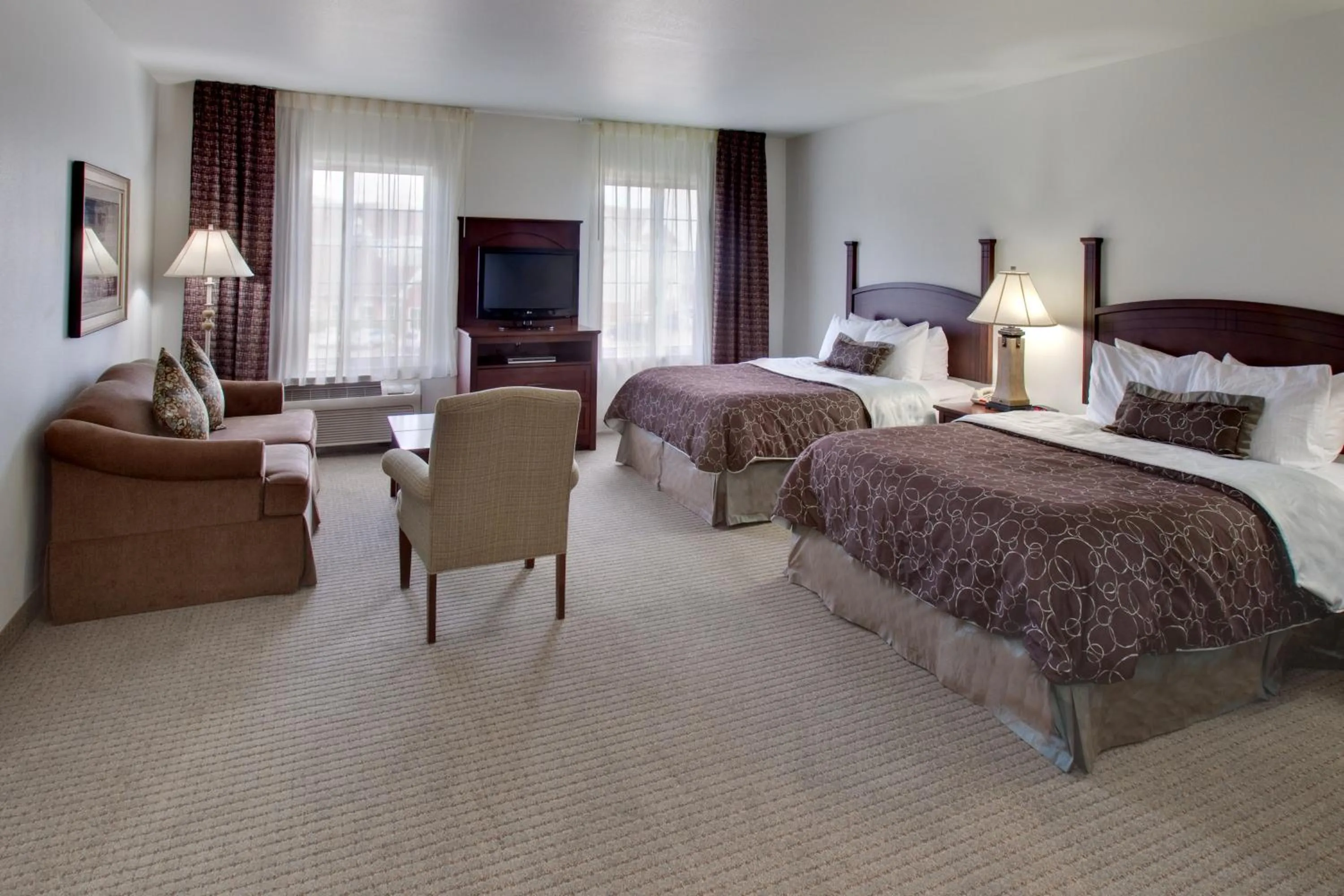 Photo of the whole room, Bed in Staybridge Suites Rockford by IHG