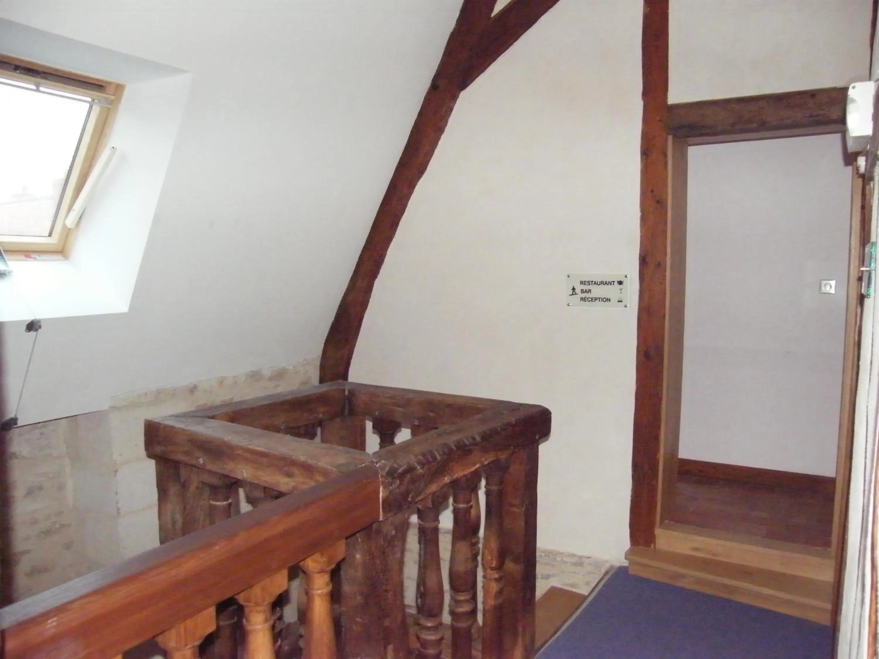 Decorative detail in Logis Hôtel Restaurant Le Puits Doré