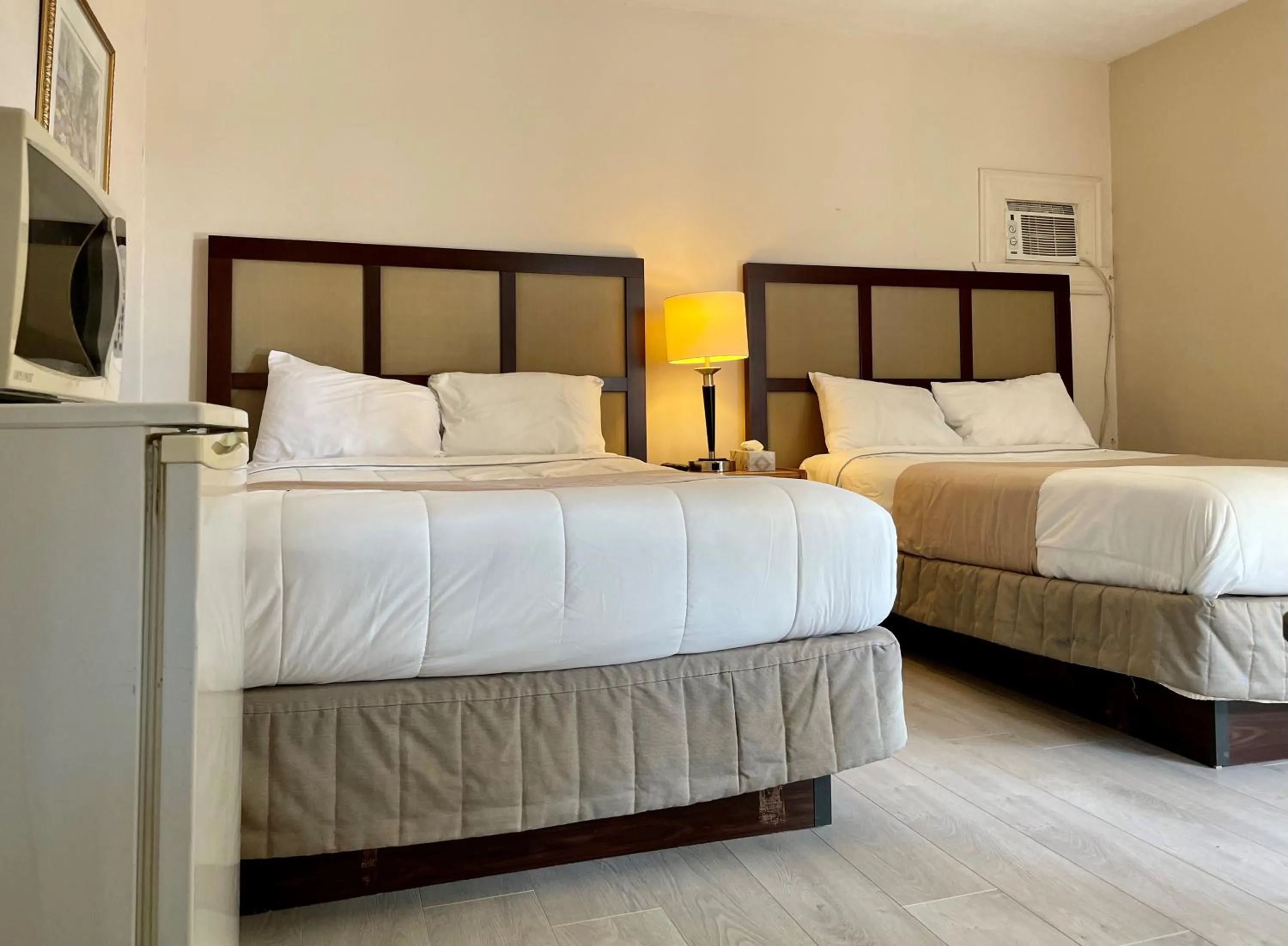 Bed in Motel Saint-Hilaire