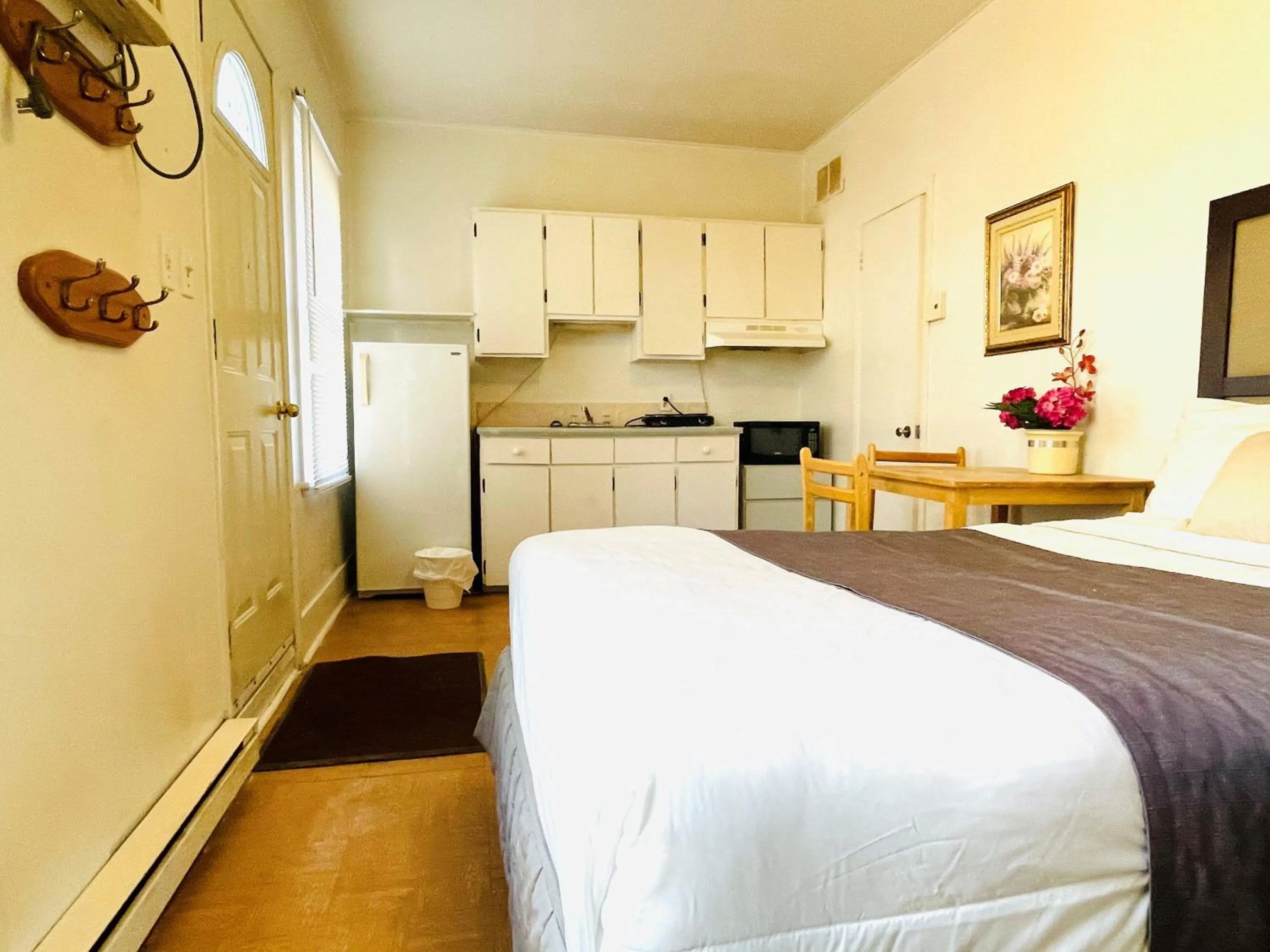 Bed in Motel Saint-Hilaire