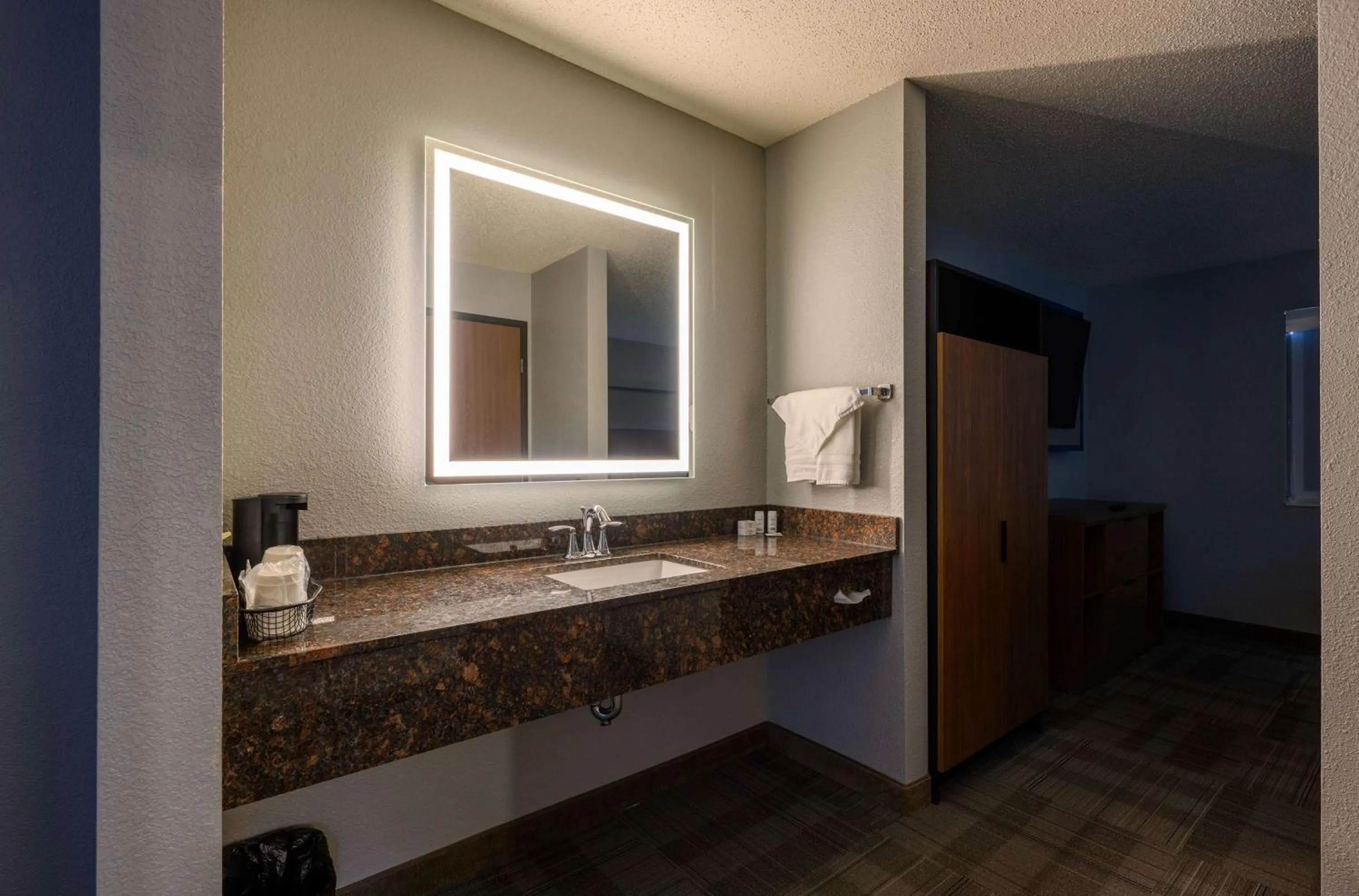 Bathroom in AmericInn by Wyndham Monroe