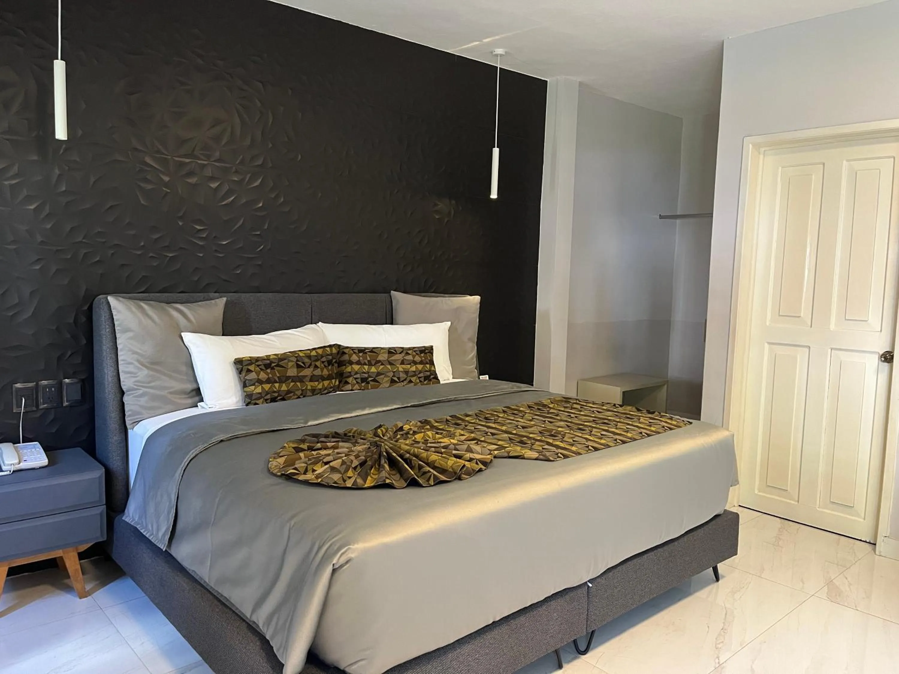 Bed in Chanpaal Hotel Boutique - Only Adults