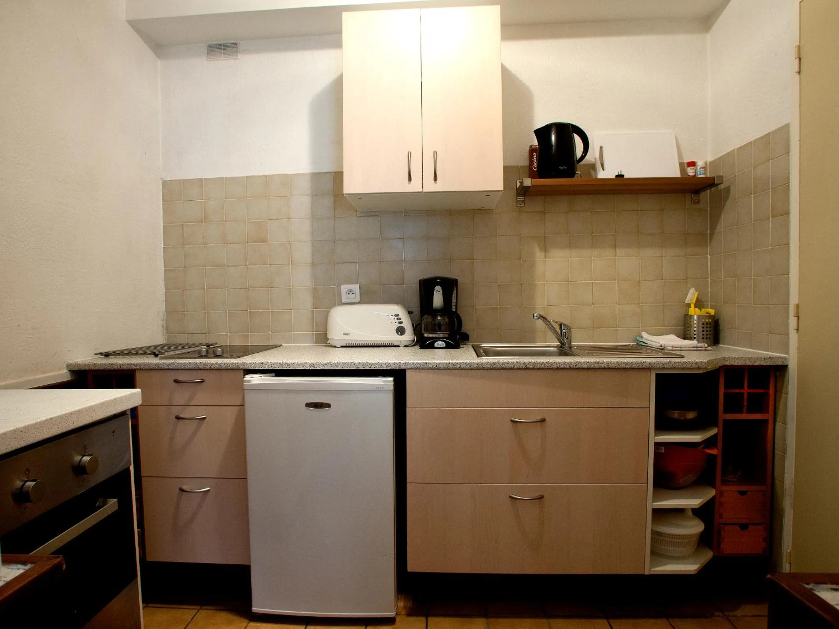 Kitchen or kitchenette in Hôtel Du Soleil