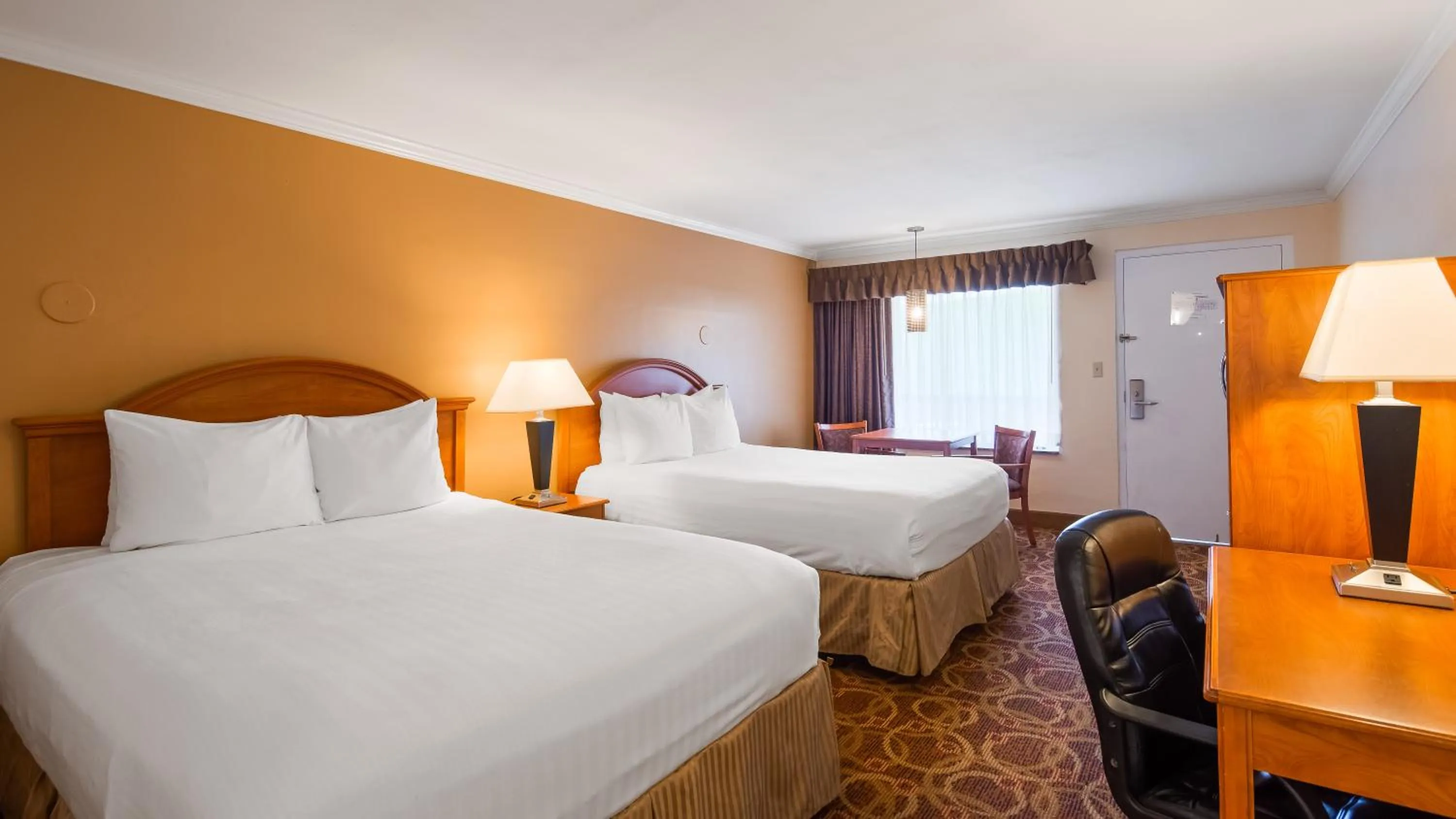 Bedroom in Sturgis Lodge & Suites, Travelodge by Wyndham