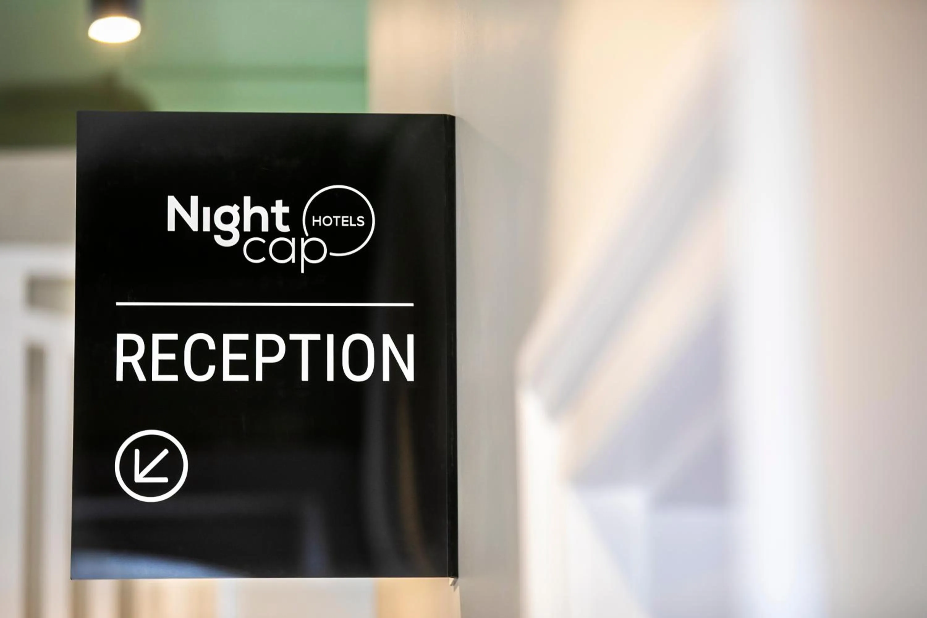 Property logo or sign in Nightcap at Exeter Hotel