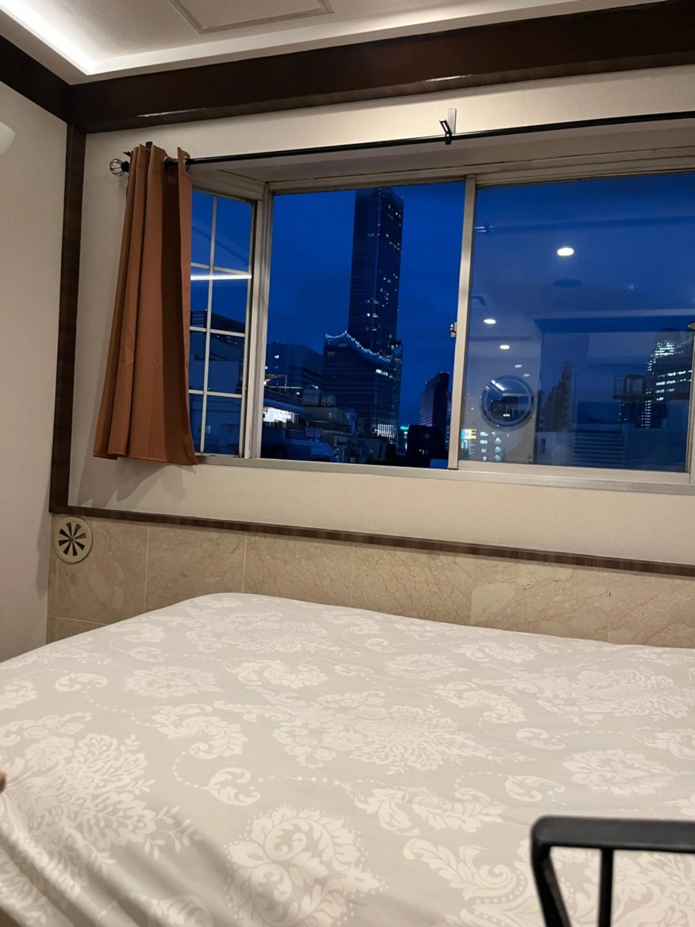 Bed in City Hotel Southern Cross