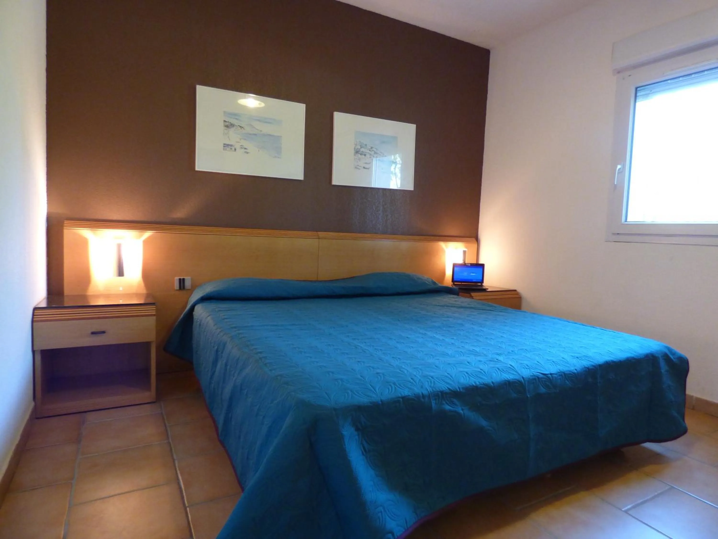 Bedroom in Appart'Hotel Festival Sud Suites - Avignon TGV