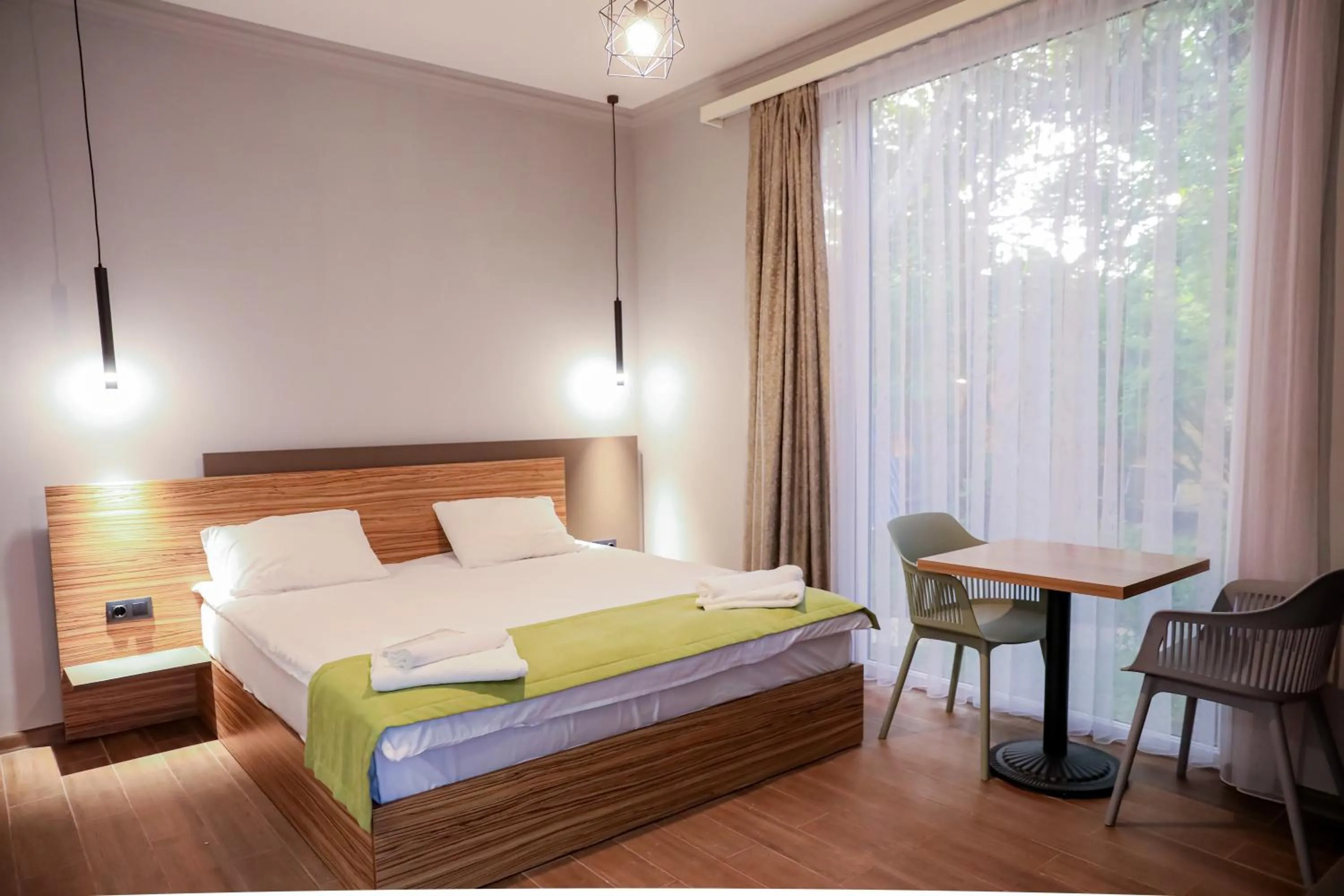 Bed in Garden Inn Resort Sevan