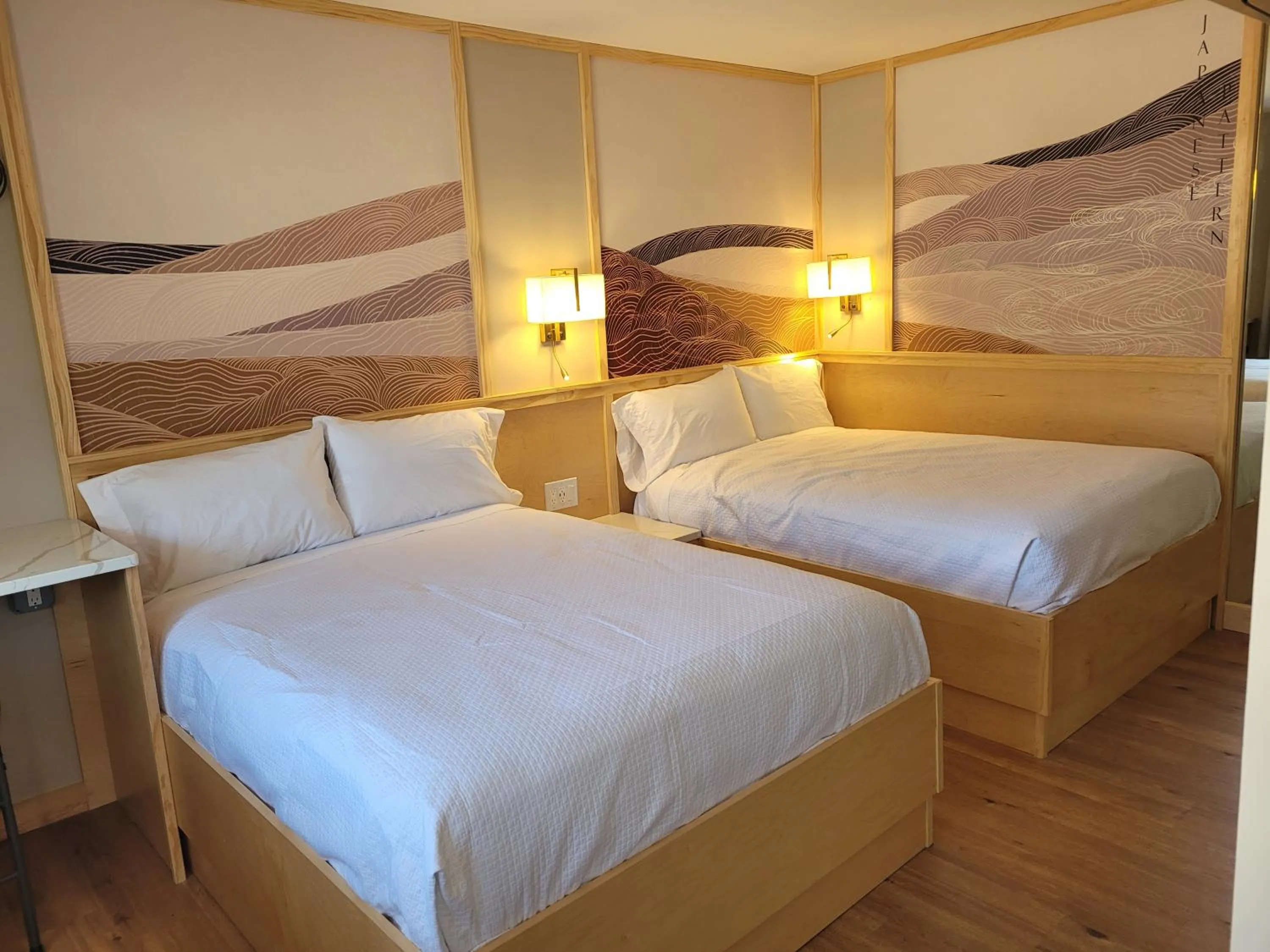 Bed in Greenview Inn Riverhead