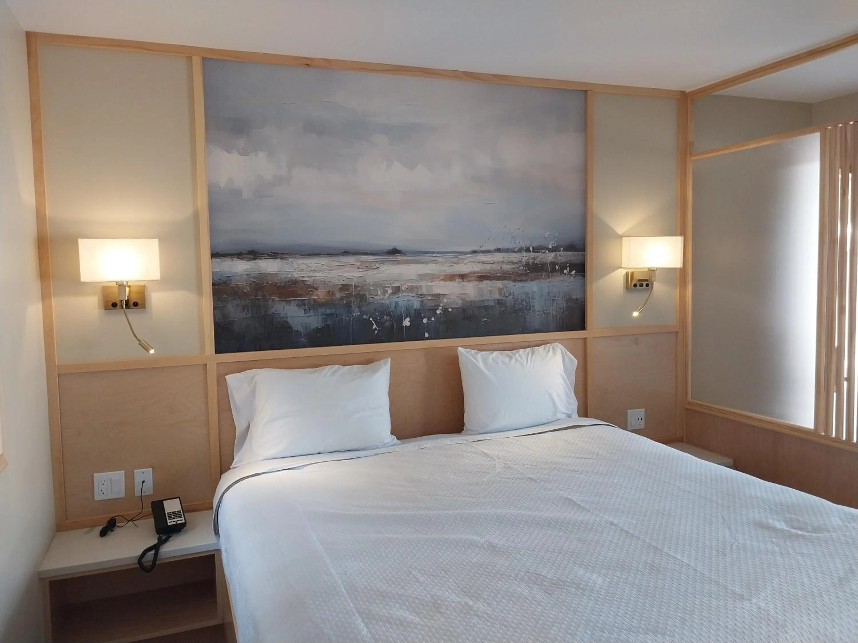 Bed in Greenview Inn Riverhead