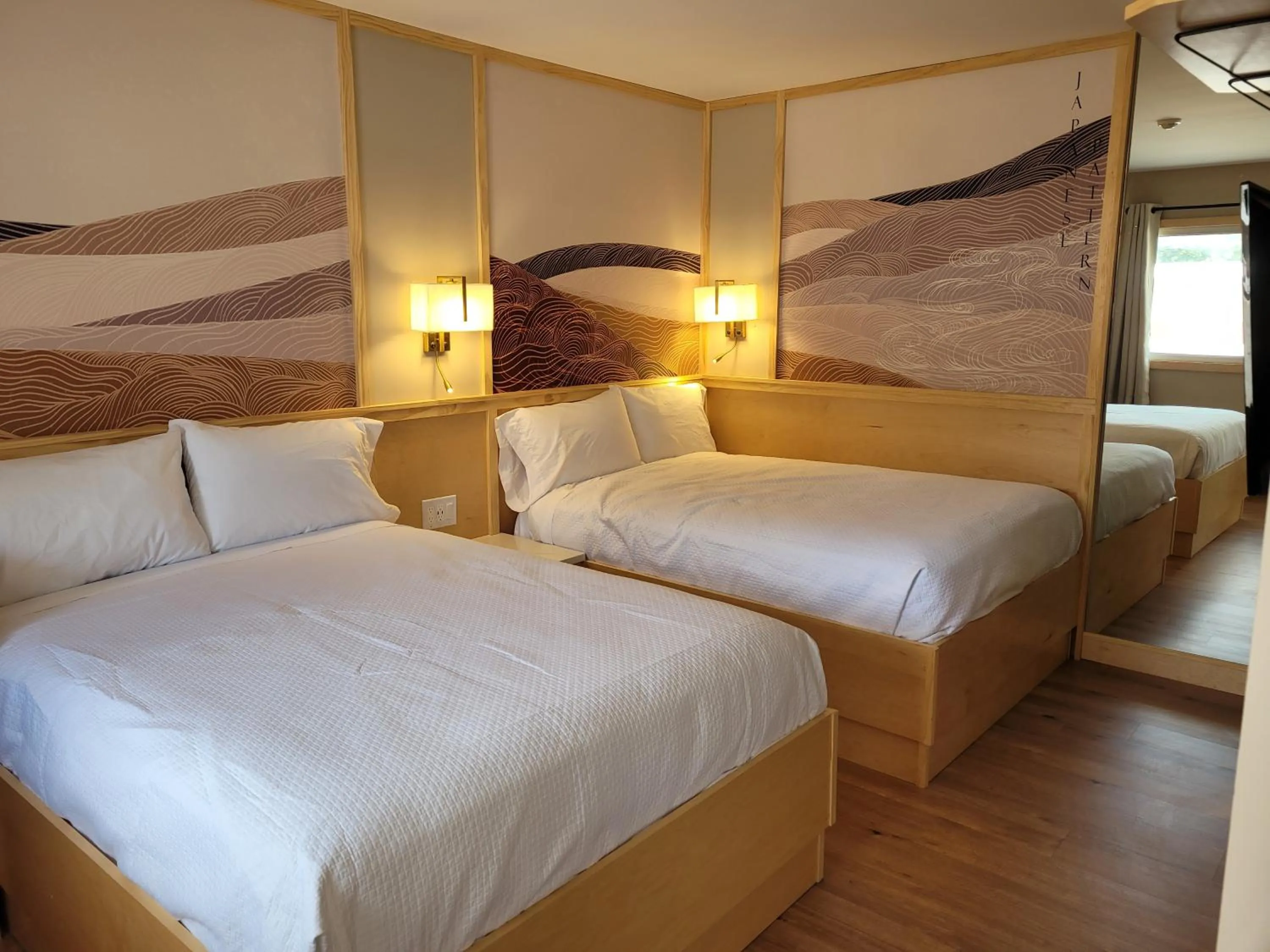 Bed in Greenview Inn Riverhead