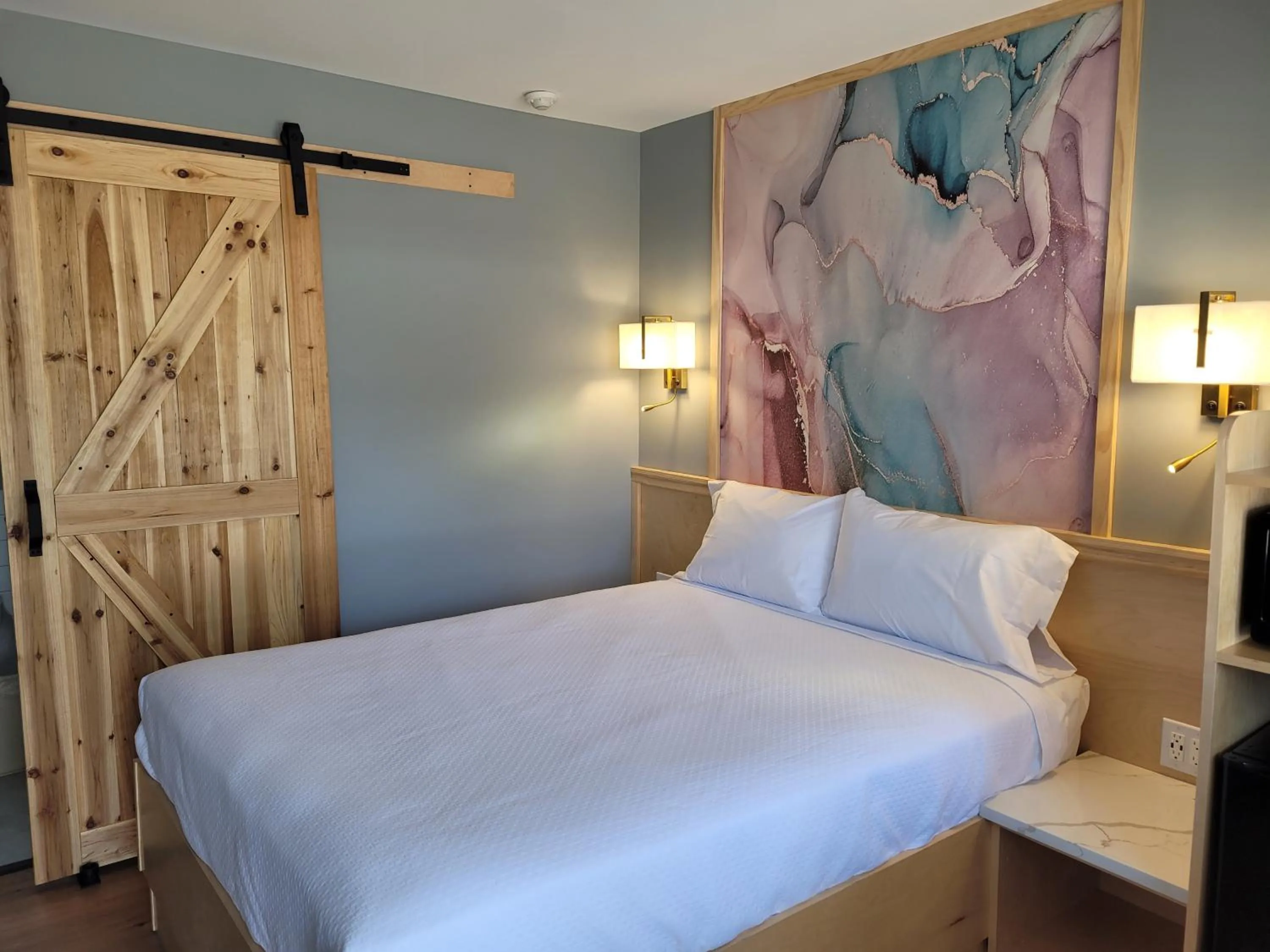 Bed in Greenview Inn Riverhead