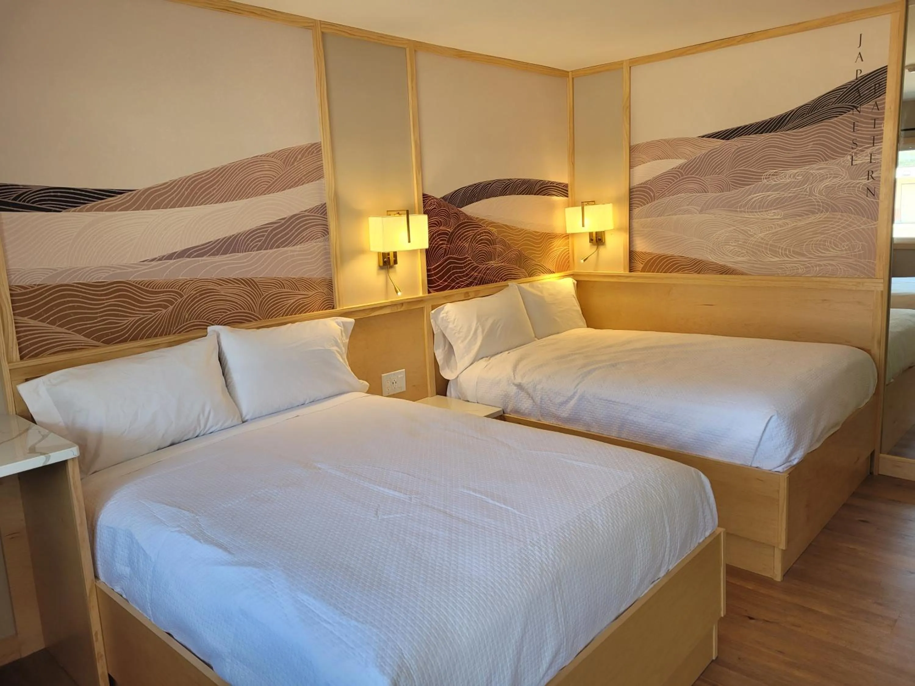 Bed in Greenview Inn Riverhead