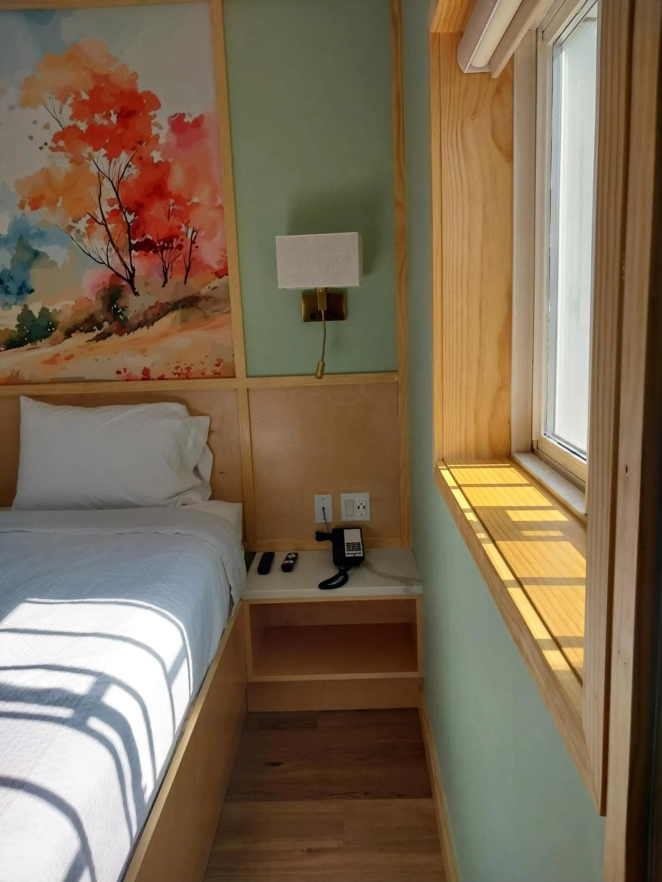 Bed in Greenview Inn Riverhead