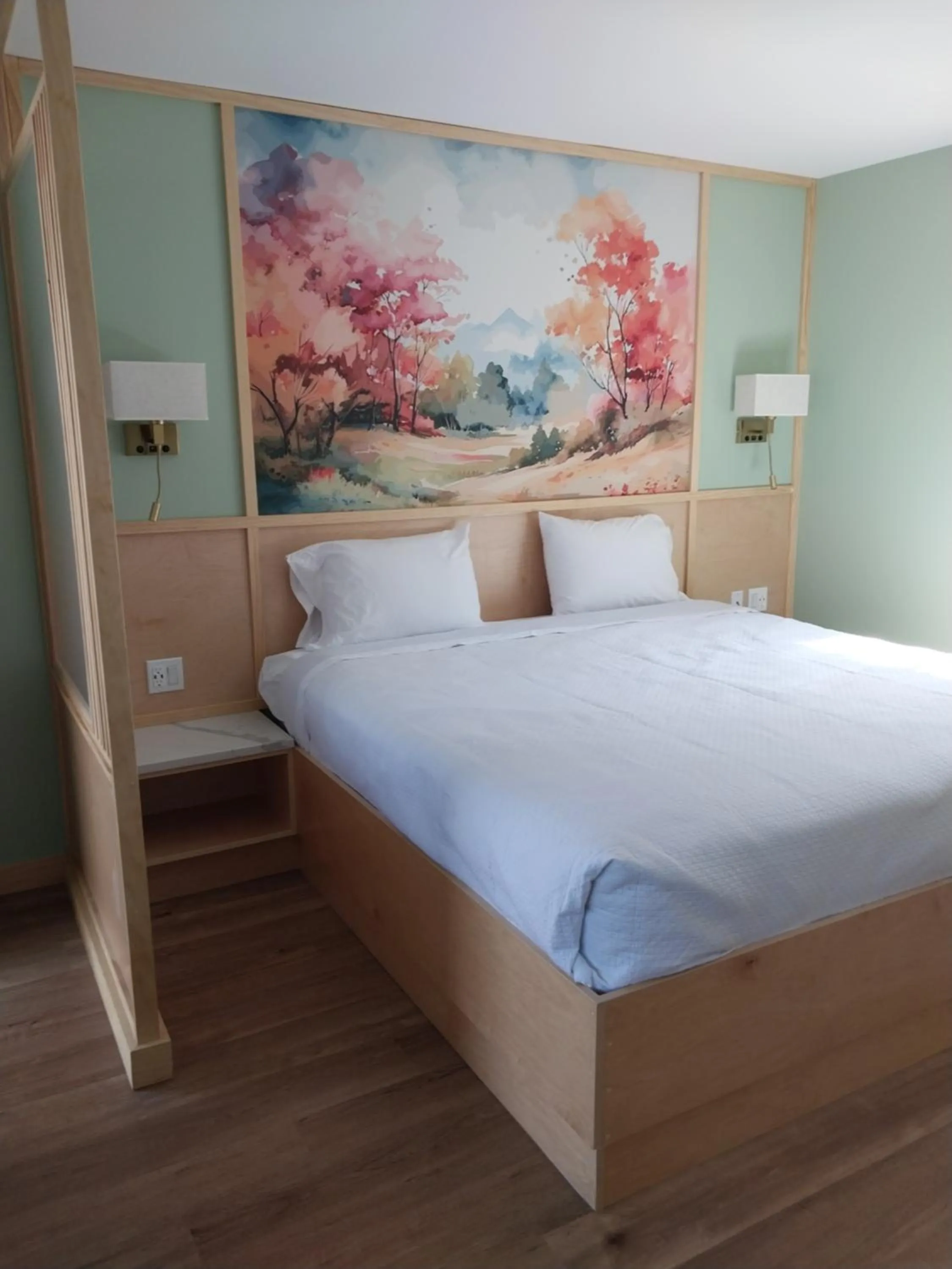 Bed in Greenview Inn Riverhead