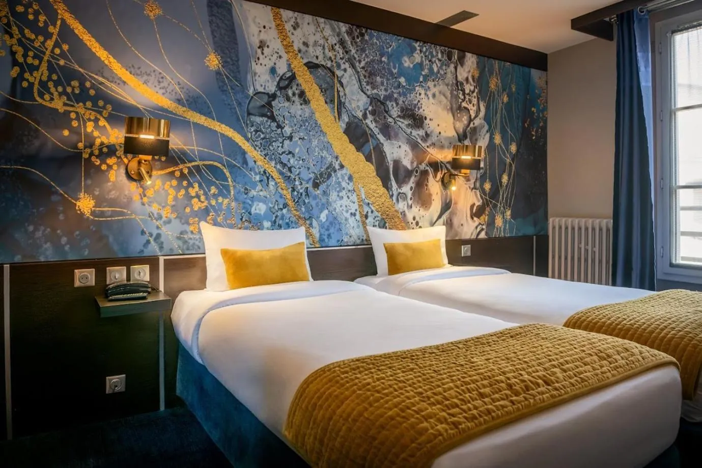 Bed in Hôtel du Parc Montparnasse