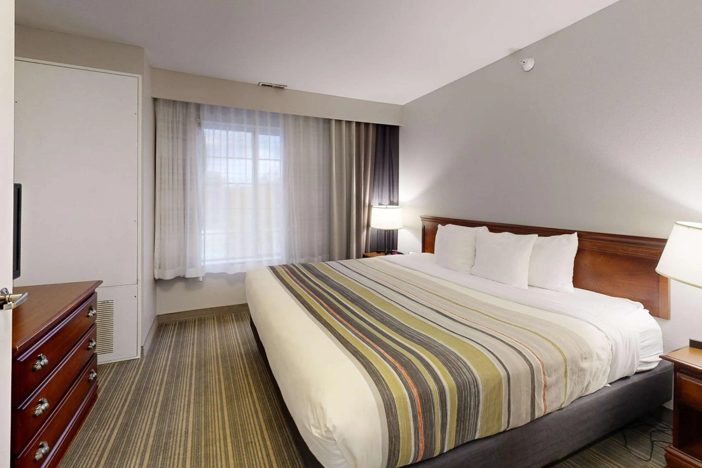 Bedroom, Bed in Country Inn & Suites by Radisson, Michigan City, IN