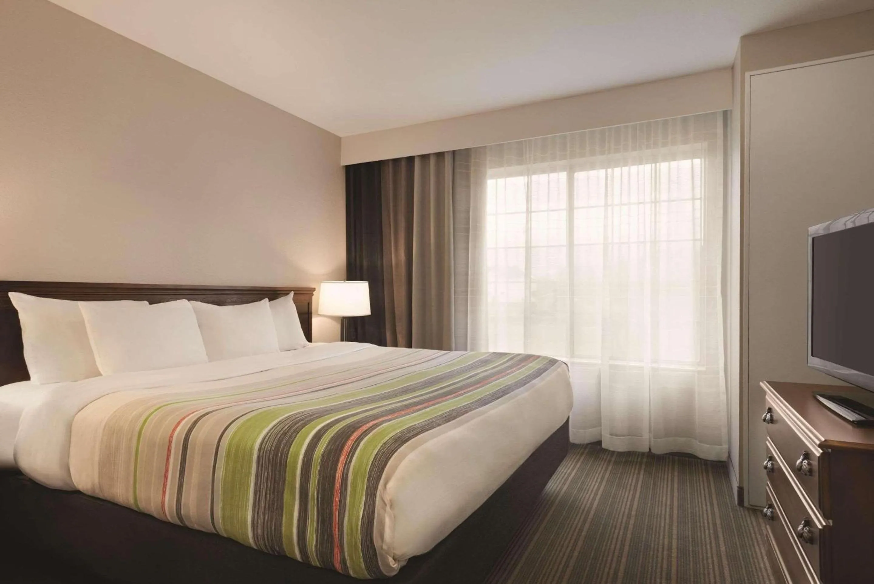 Bedroom, Bed in Country Inn & Suites by Radisson, Michigan City, IN