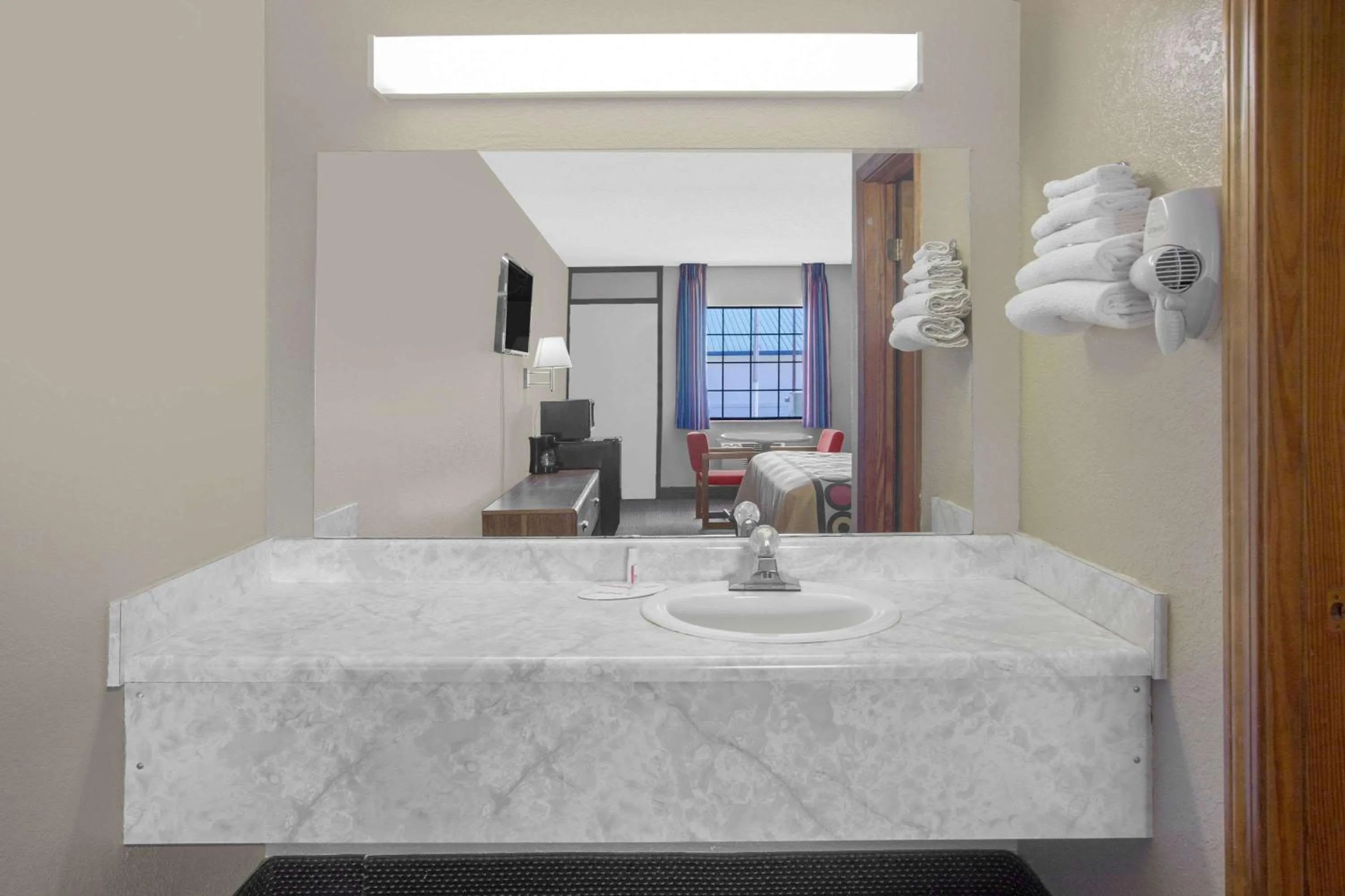 Bathroom in Super 8 by Wyndham Clarksville AR