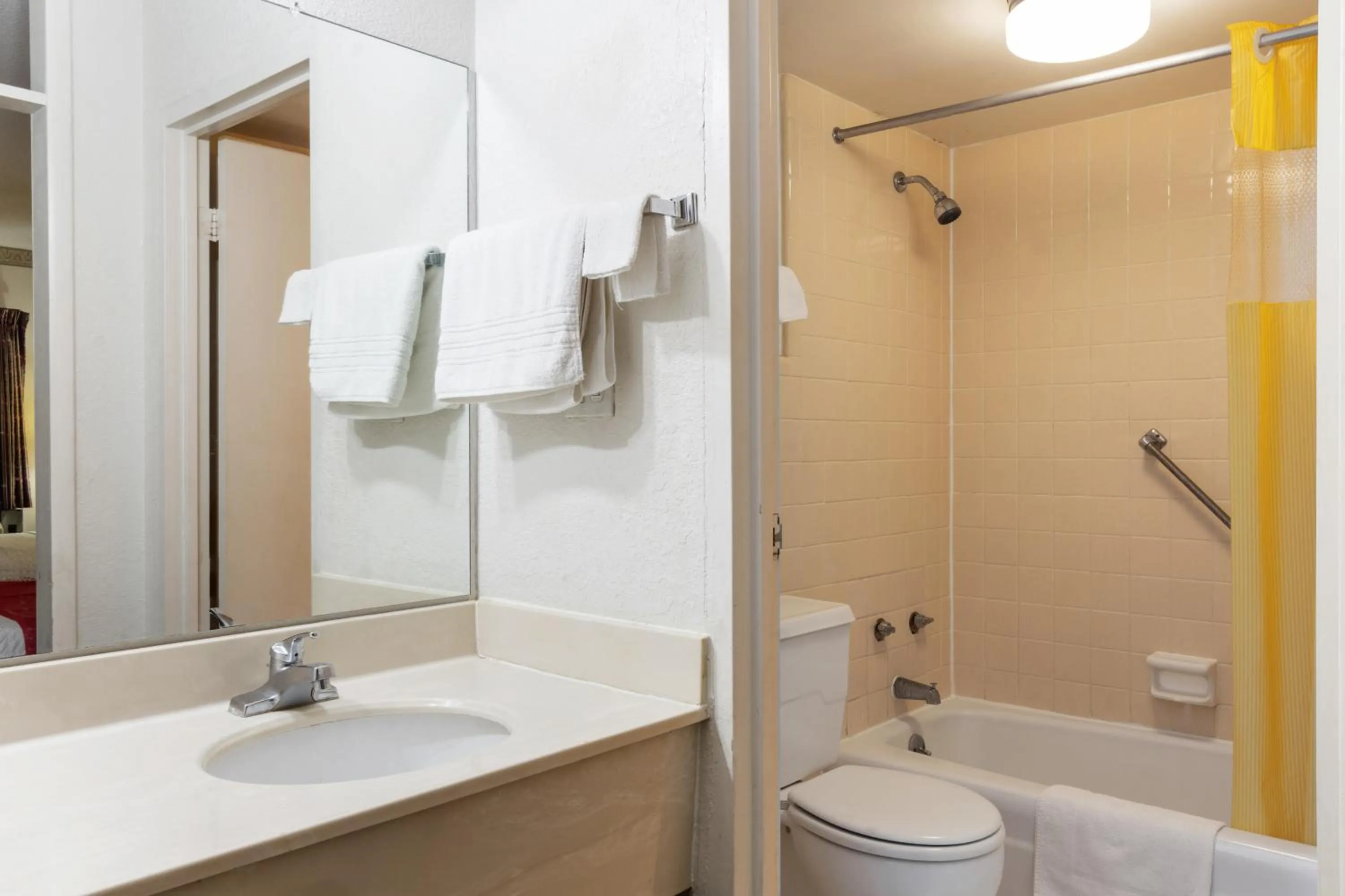 Bathroom in Traveler's Place Inn & Suites