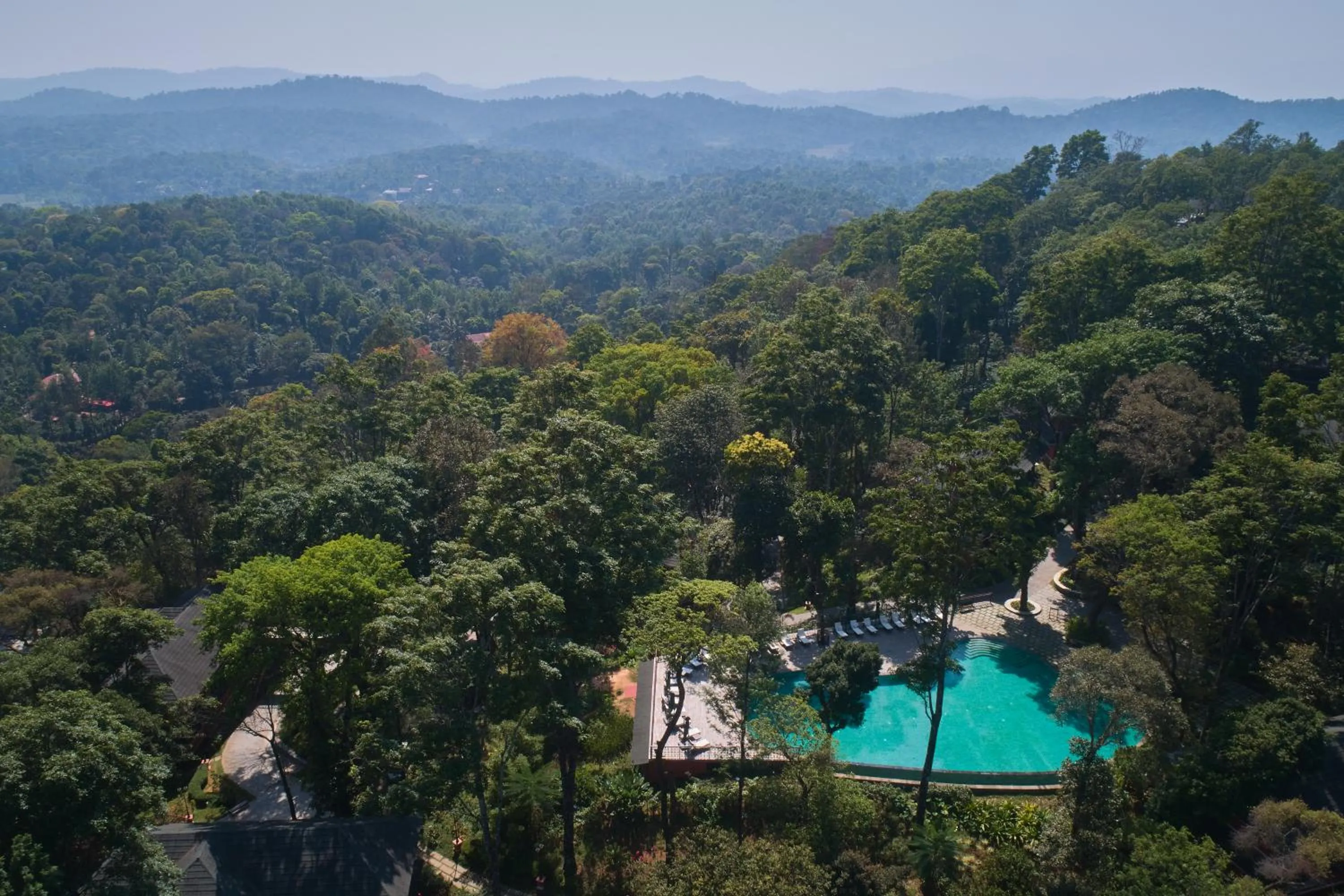 Swimming pool in Coorg Wilderness Resort & Spa