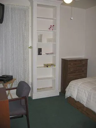 Bed in Olde Judge Mansion B&B