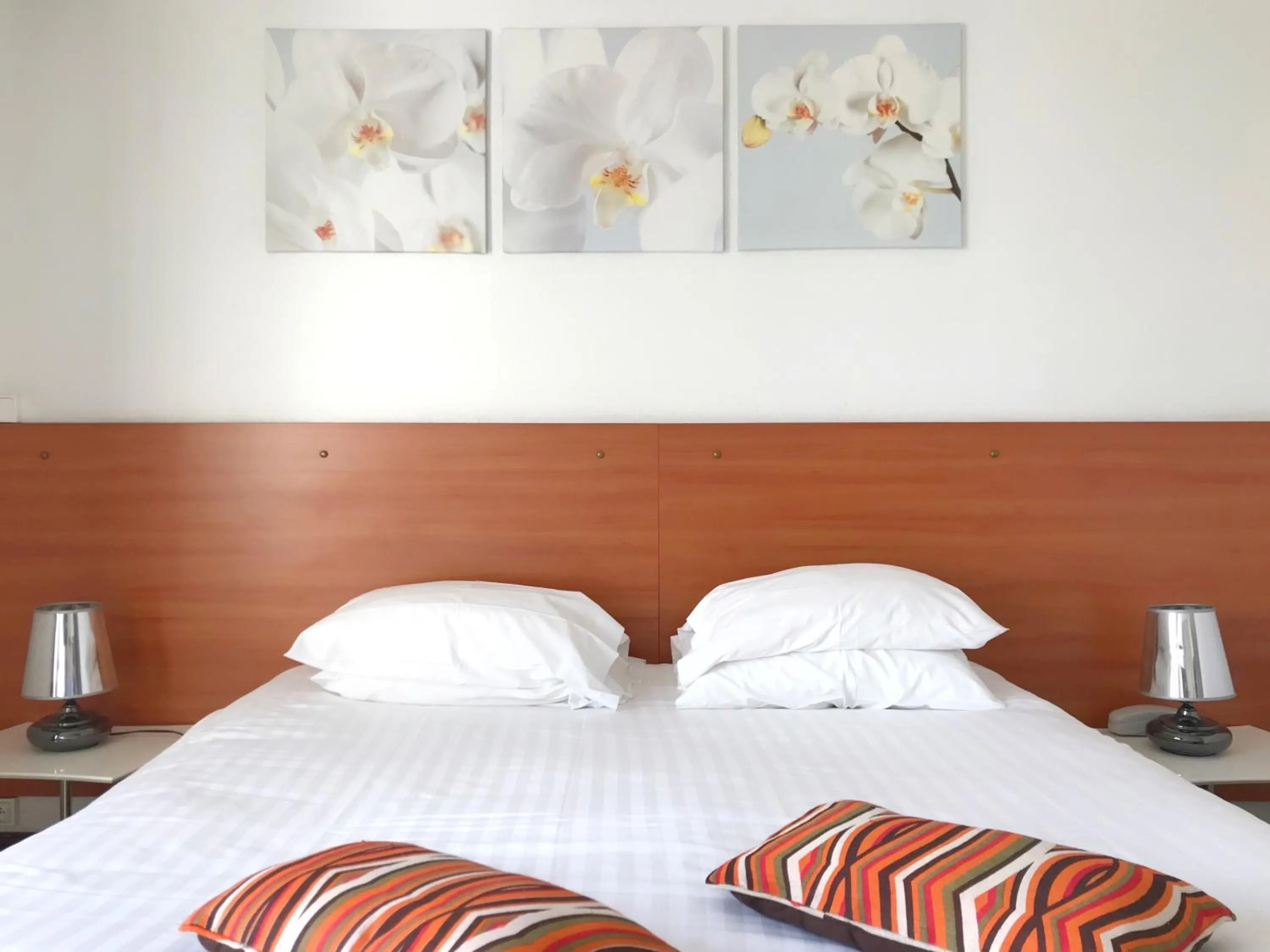 Bed in Hotel Colbert