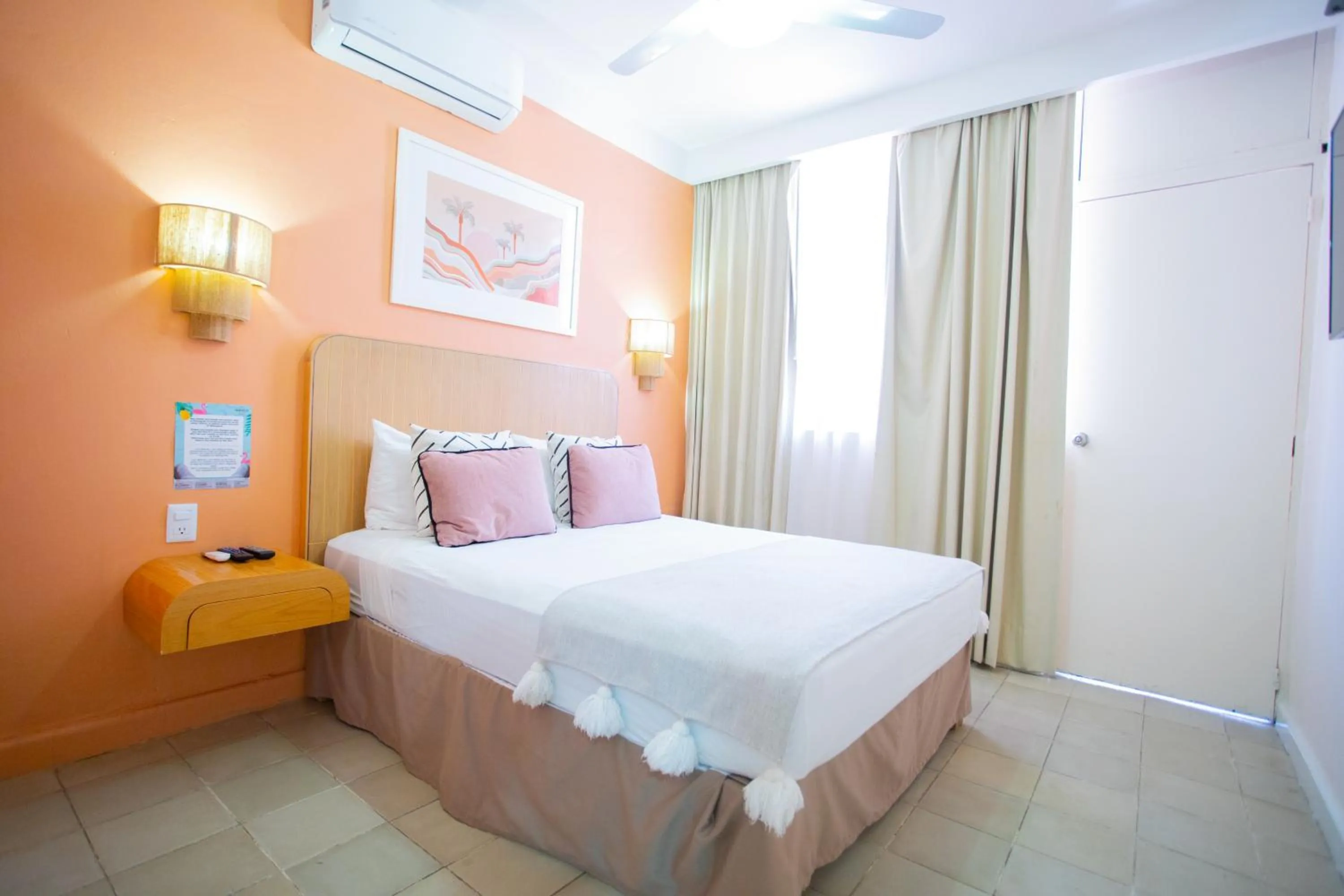 Bed in Hotel Tropicus Boutique