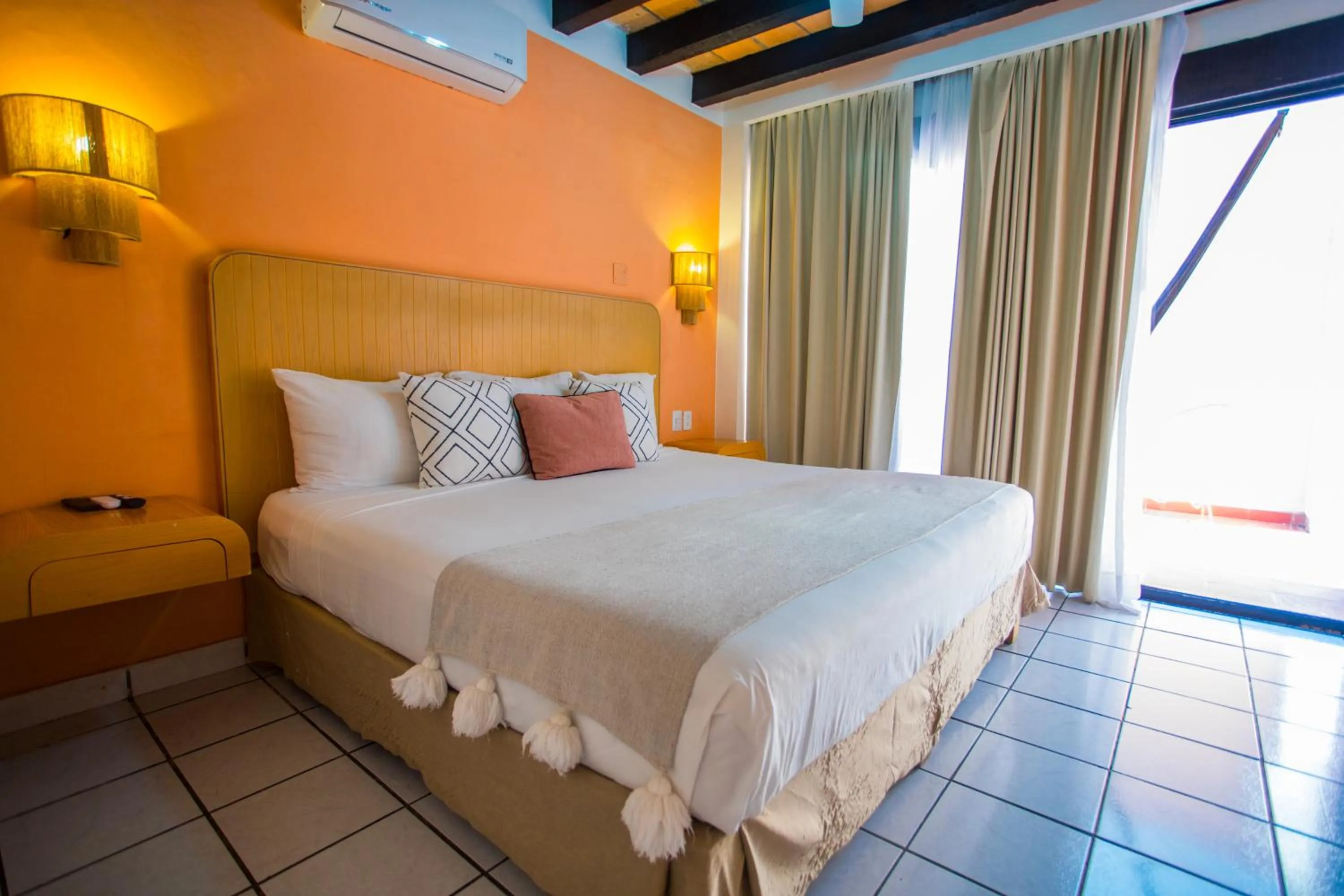 Bed in Hotel Tropicus Boutique