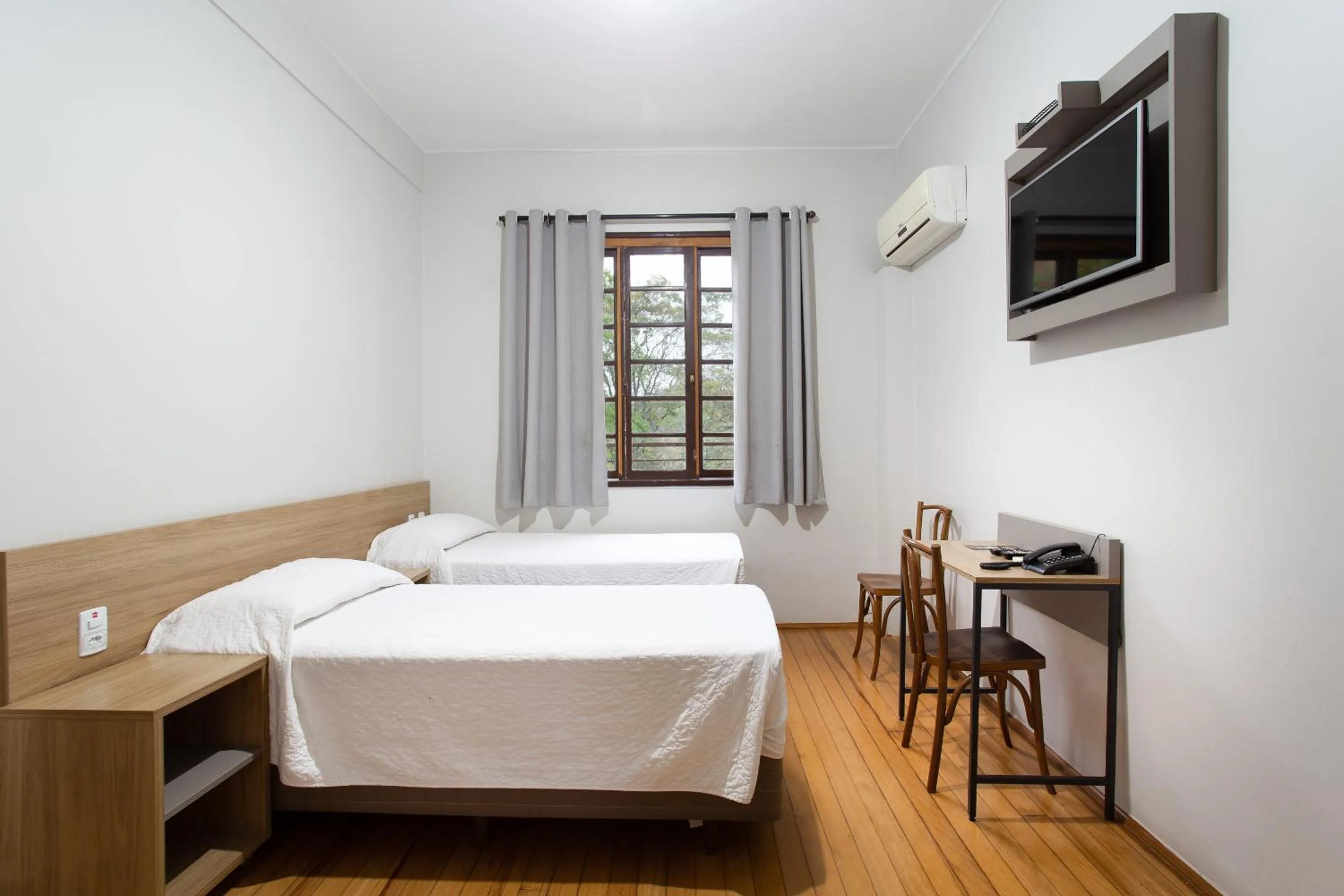 Bed in Hotel Dom Rafael Business