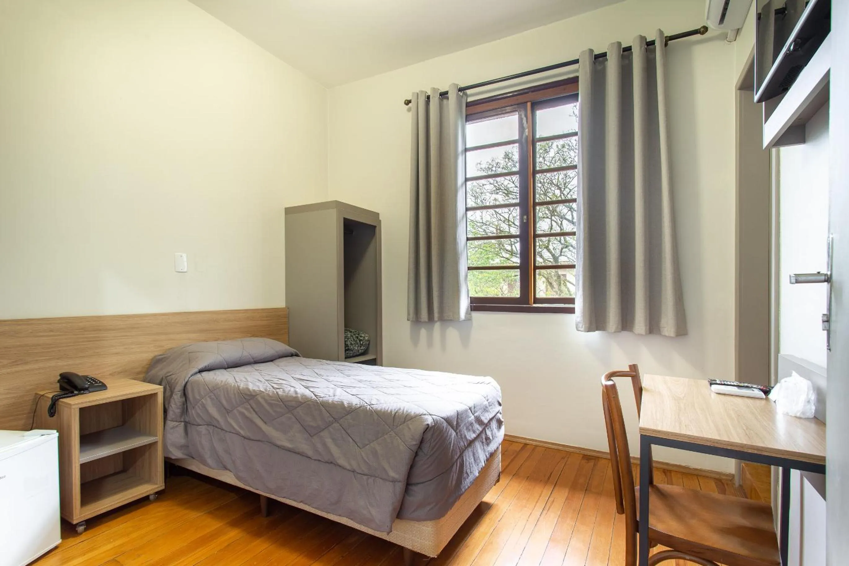 Bed in Hotel Dom Rafael Business