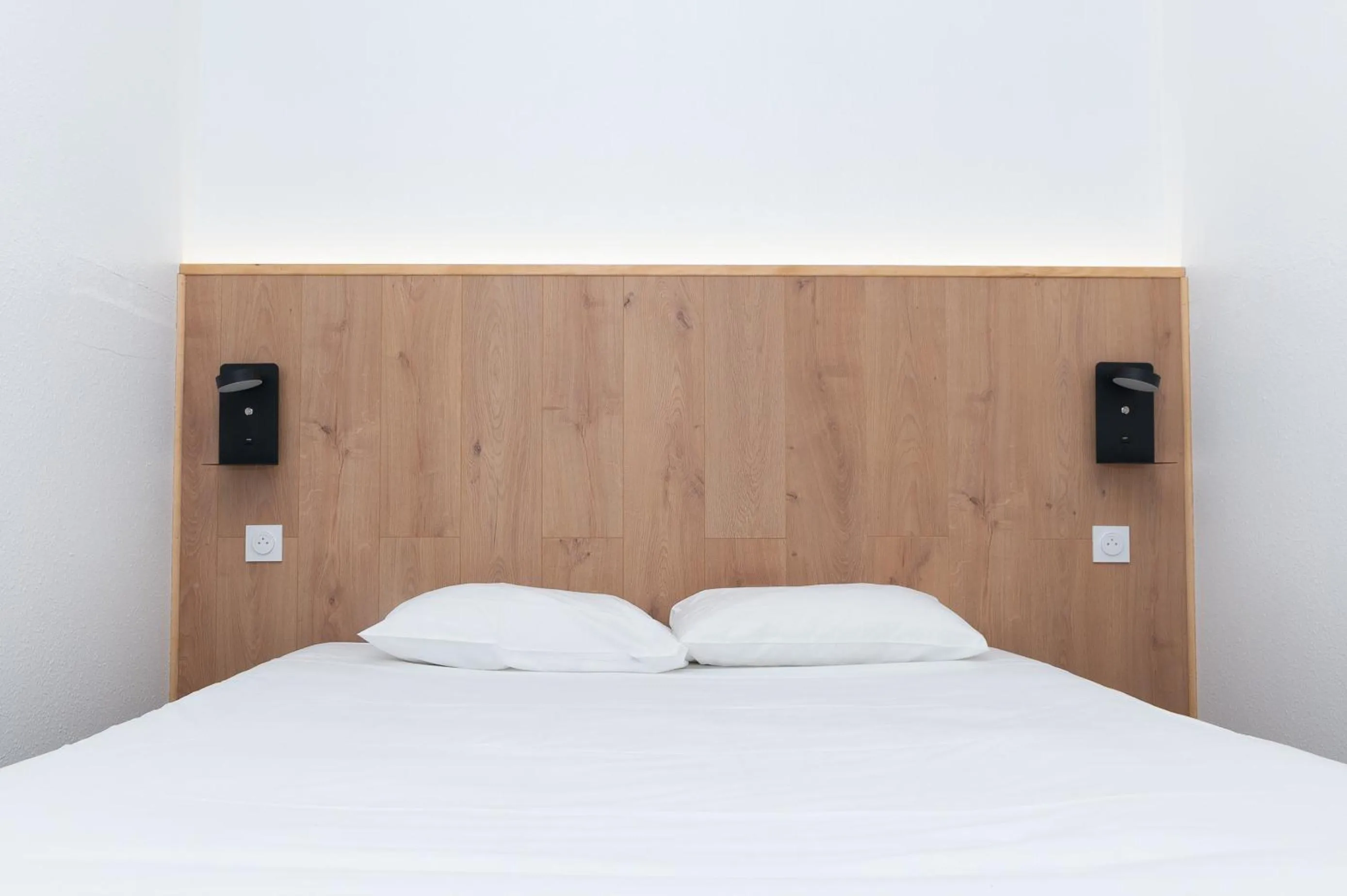 Bed in Kyriad Direct Macon Sud