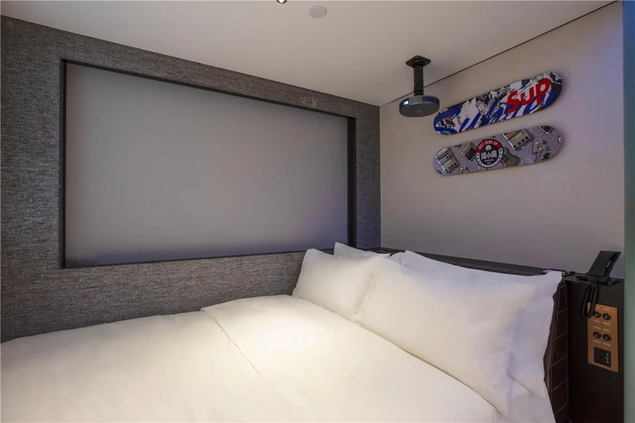 Bed in Fenk Attitude Hotel Guangzhou Railway Station