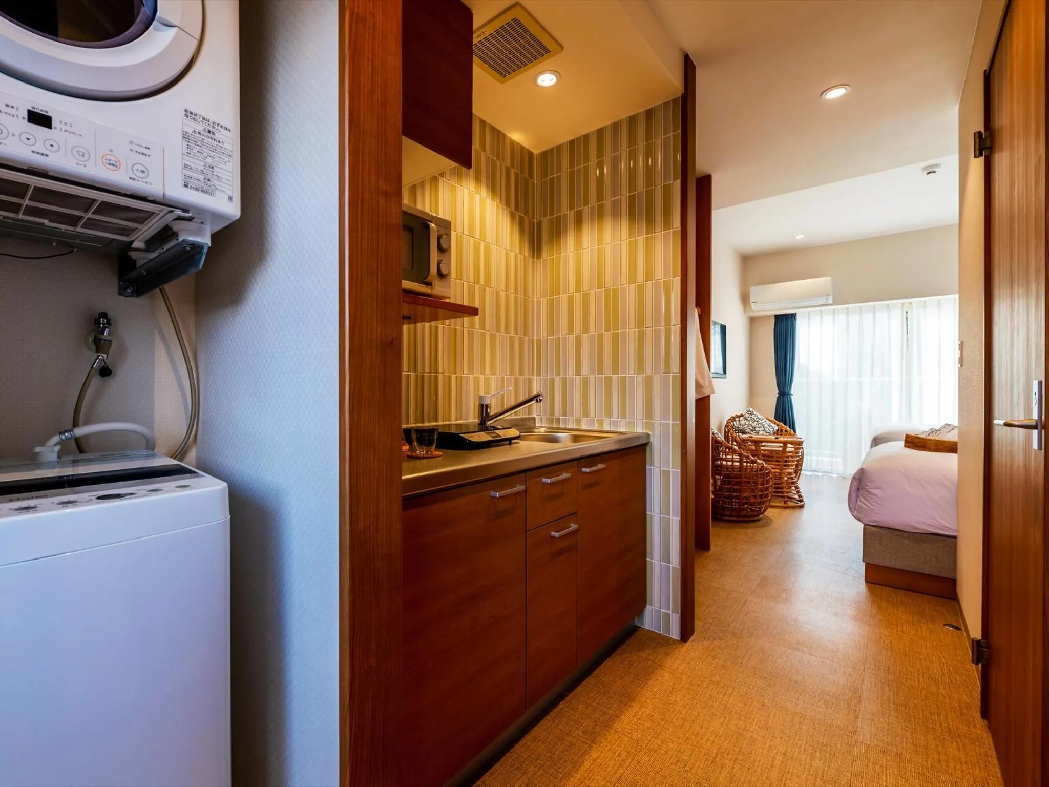 Kitchen or kitchenette, Bed in The Moana
